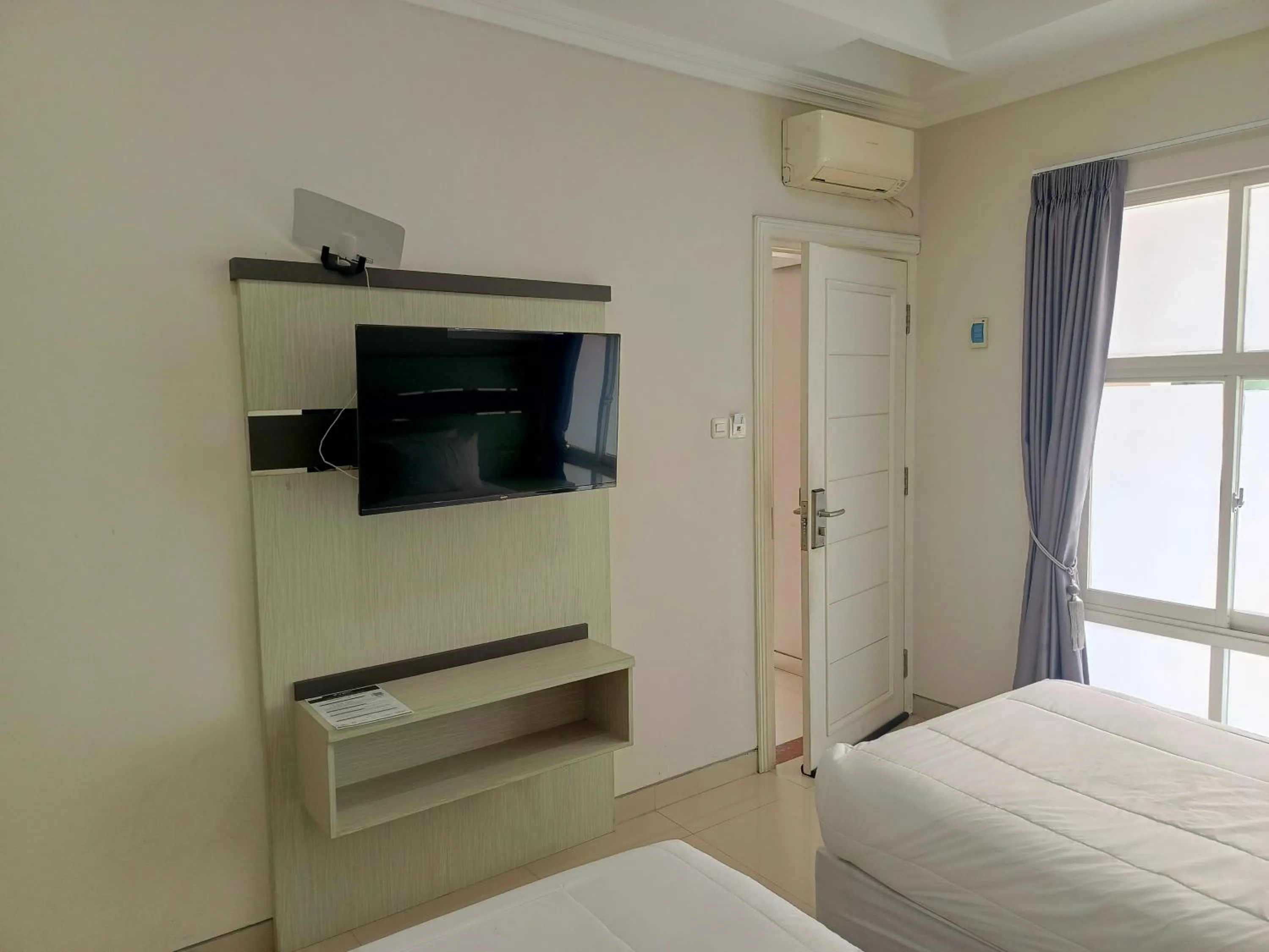 Photo of the whole room, Bed in Kyrie Hotel