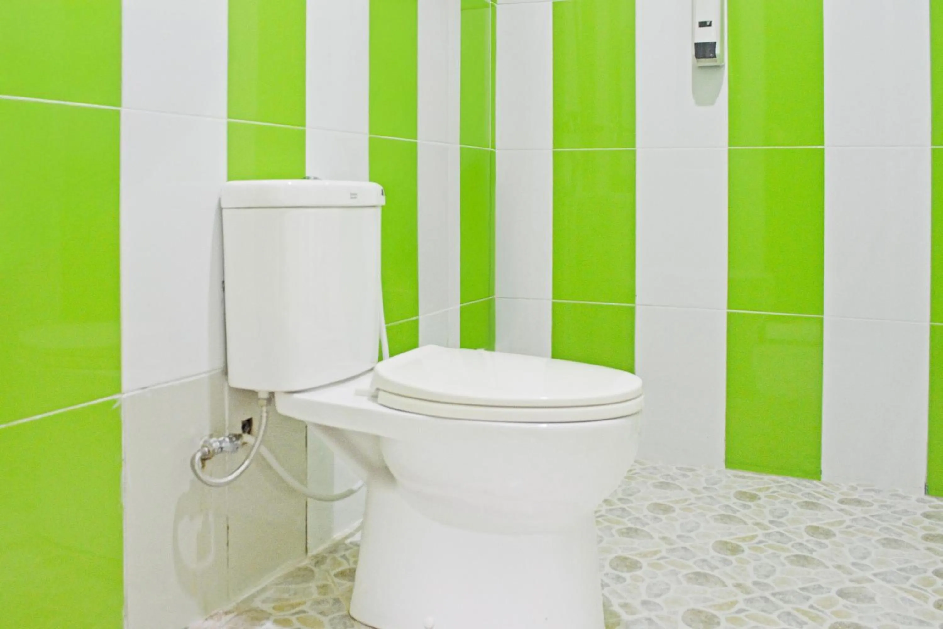 Bathroom in Collection O Balikpapan Near Balikpapan Super Block Formerly City Inn Hotel