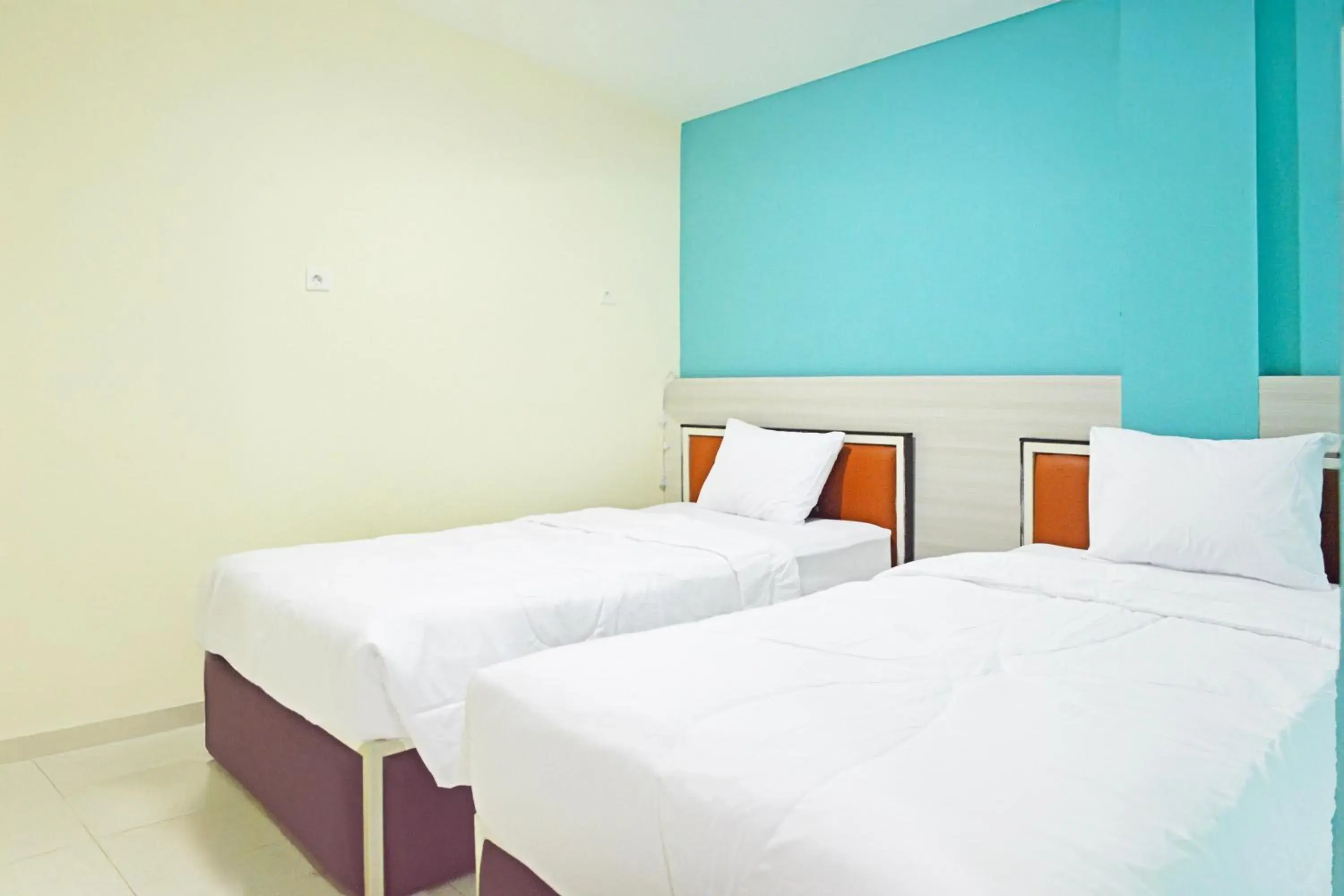 Delxue Twin Room in Collection O Balikpapan Near Balikpapan Super Block Formerly City Inn Hotel Delxue Twin Room in Collection O Balikpapan Near Balikpapan Super Block Formerly City Inn Hotel