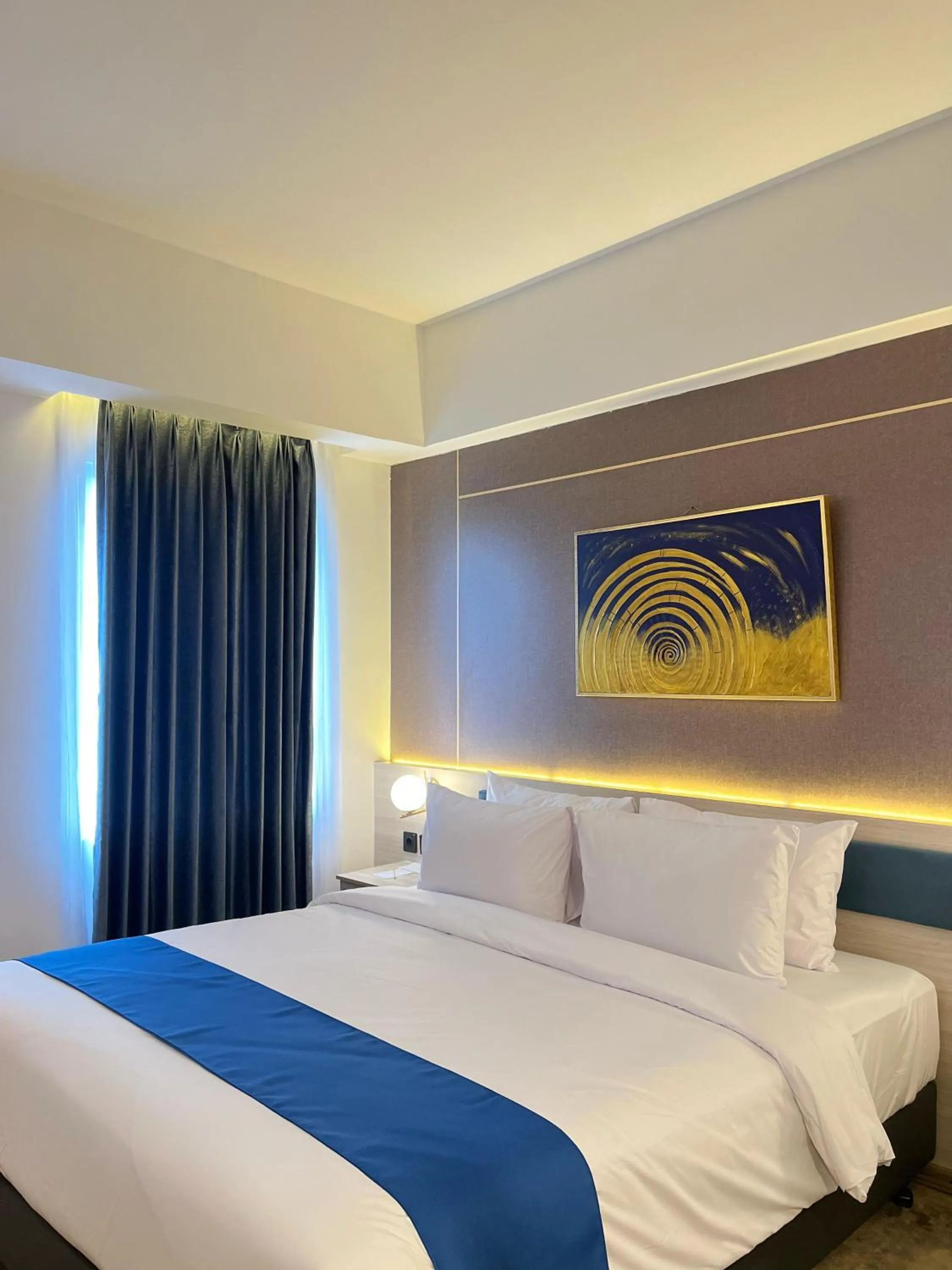 Bed in LYNN Hotel Tuban