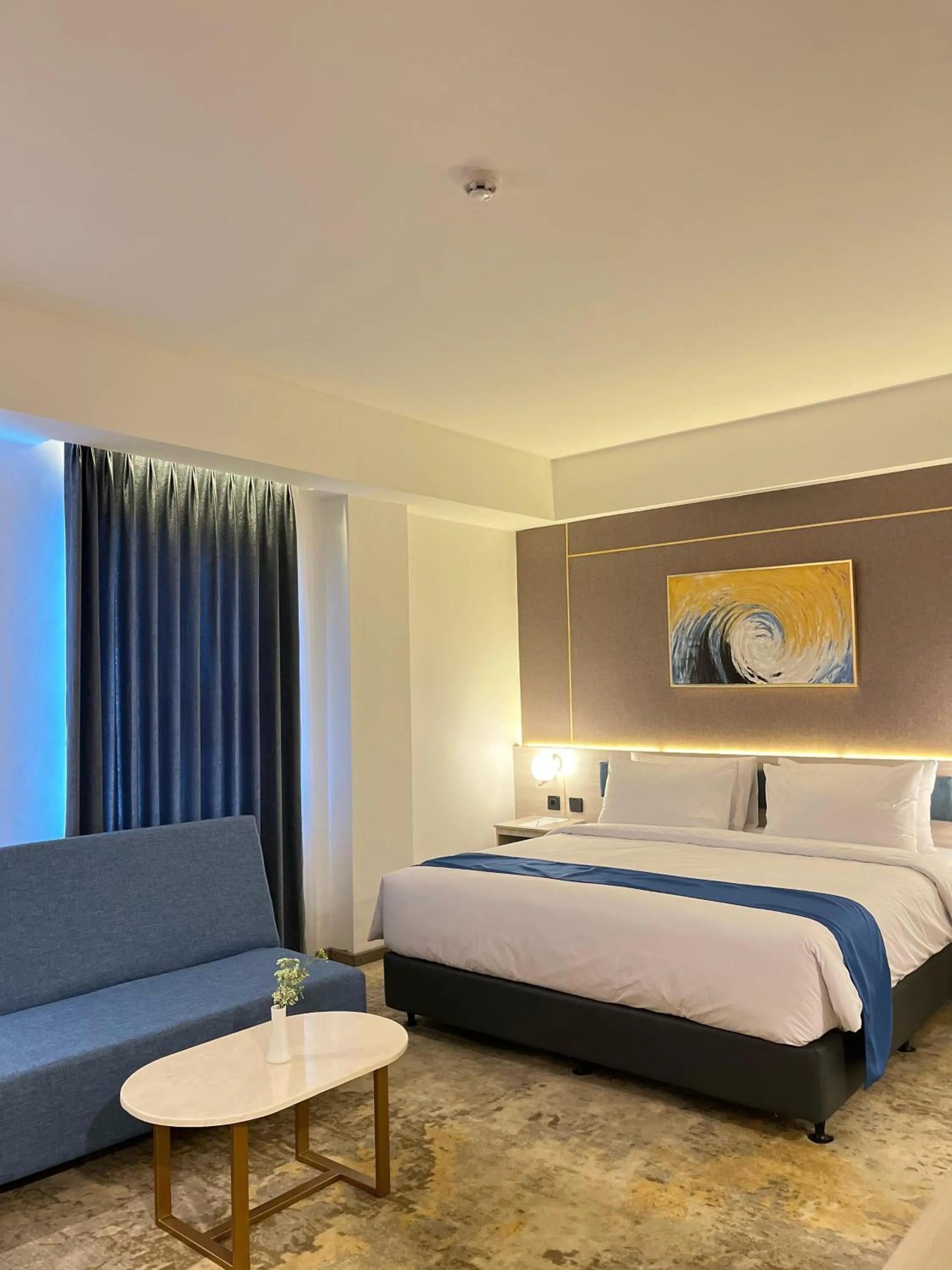 Bed in LYNN Hotel Tuban