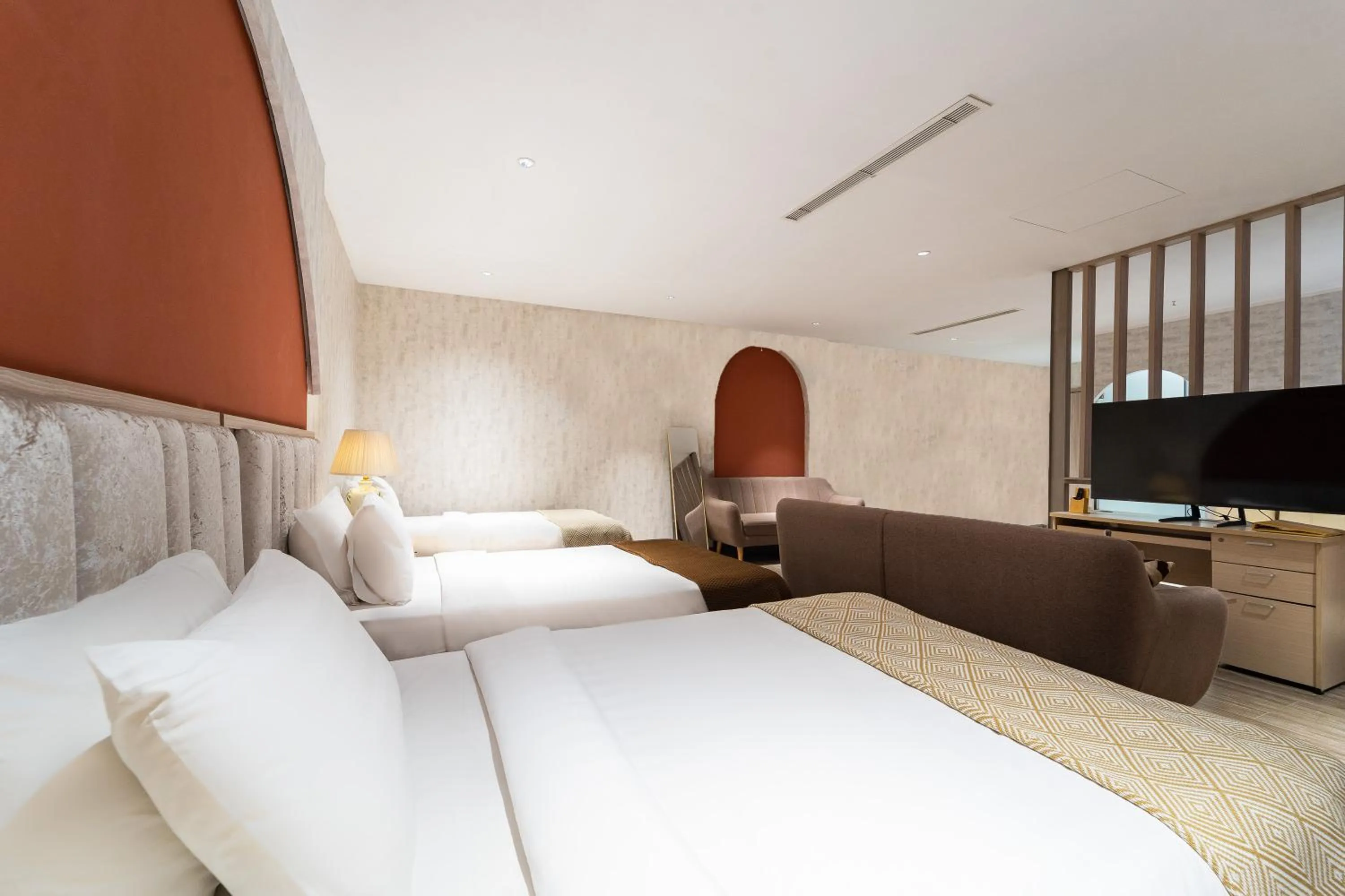 Bed in Nicecy Hotel Suites & Spa
