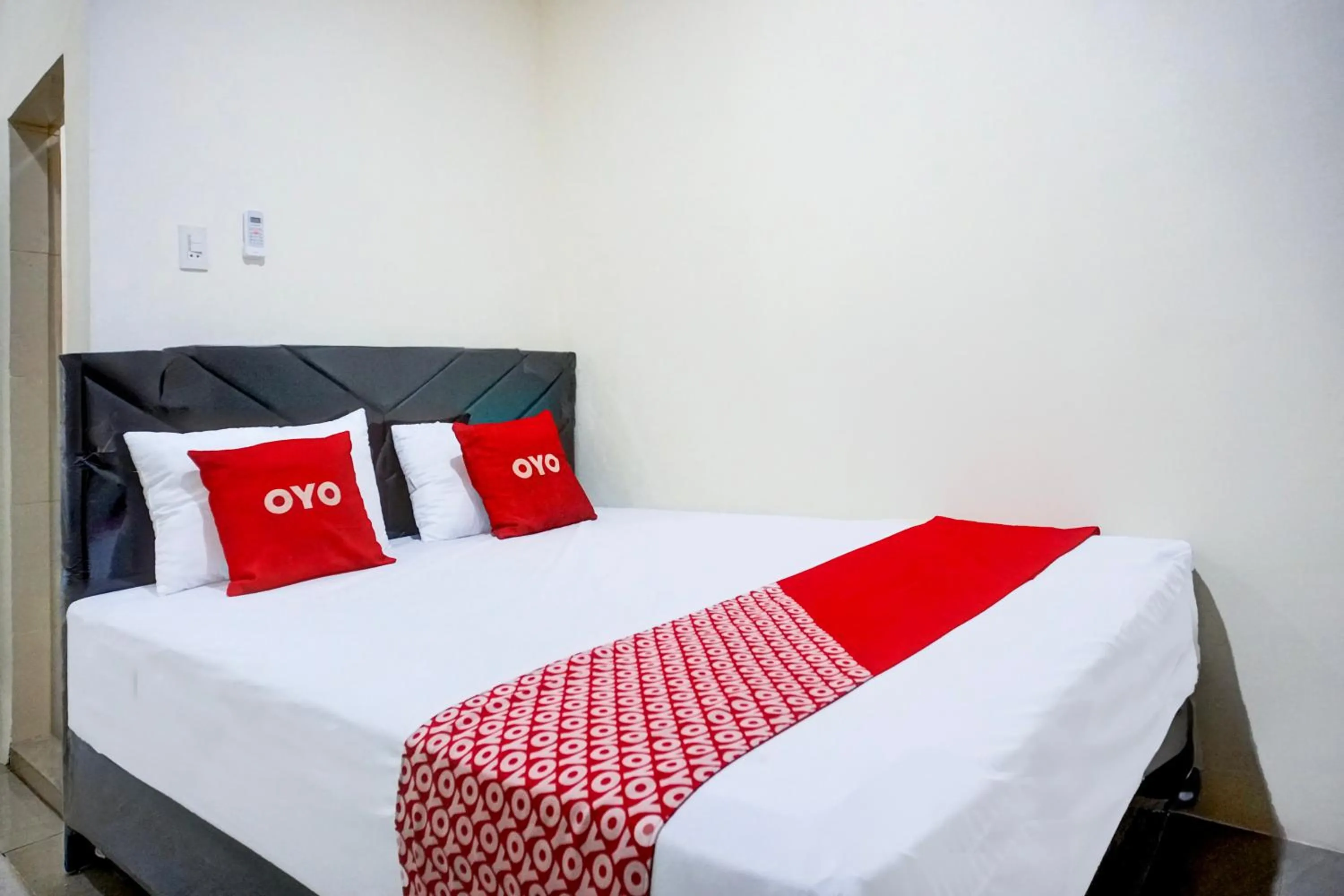 Bed in Hotel O Medan City Center Near Rumah Sakit Bunda Thamrin Formerly Mora Residence