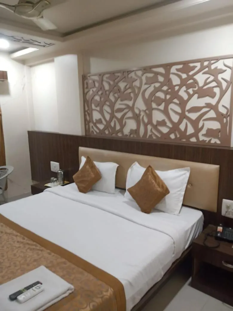 Photo of the whole room, Bed in Hotel Asian Inn, Nagpur