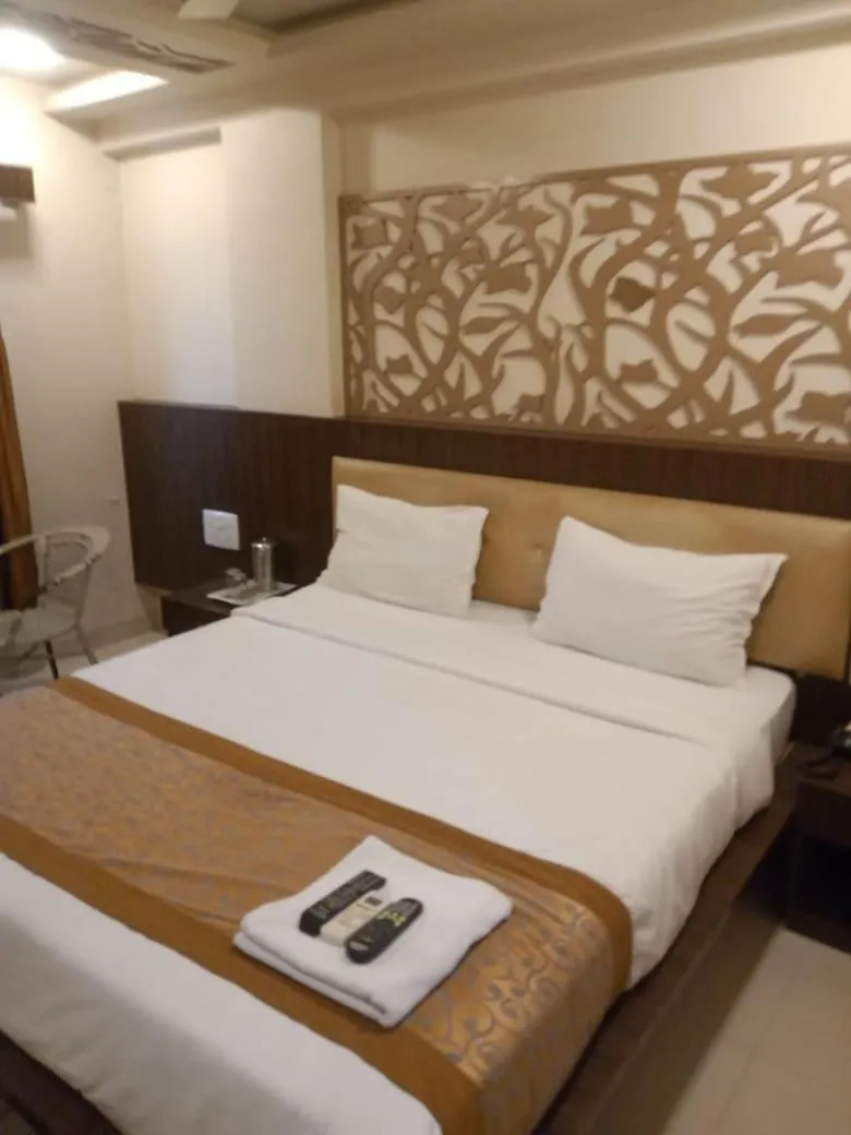 Photo of the whole room, Bed in Hotel Asian Inn, Nagpur