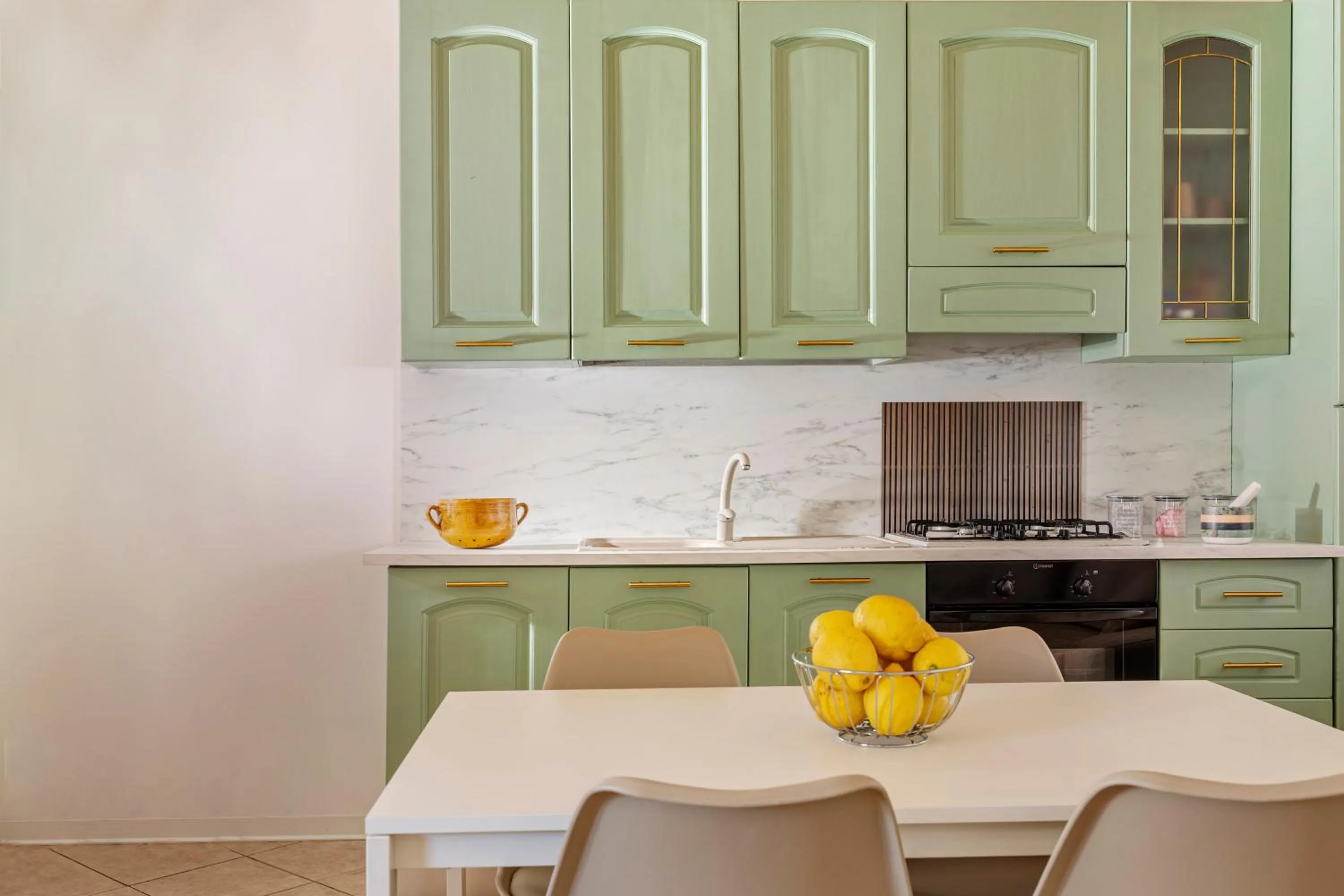 Kitchen or kitchenette in Case Vacanza Loria