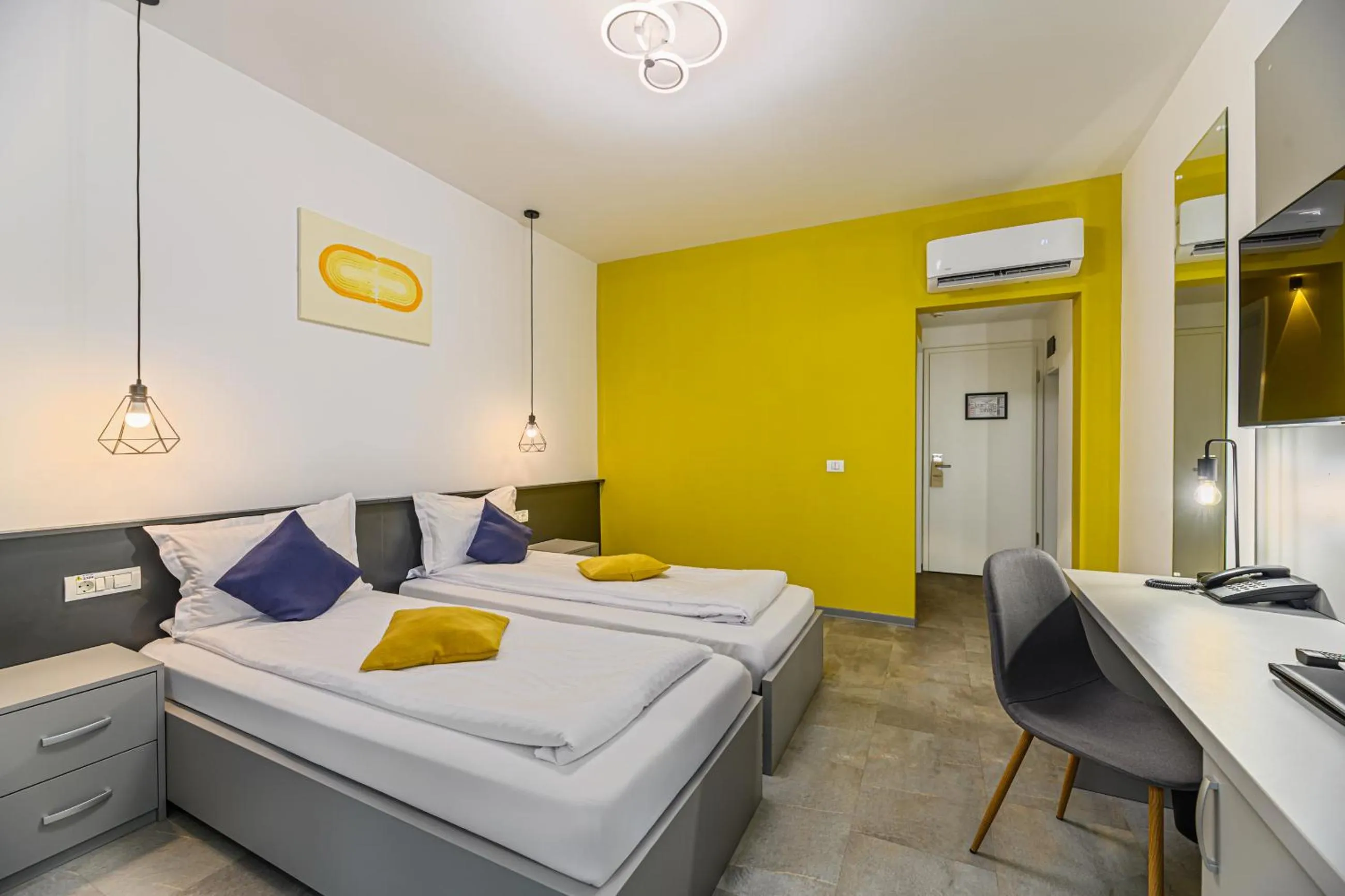 Bed in Johann Strauss Hotel