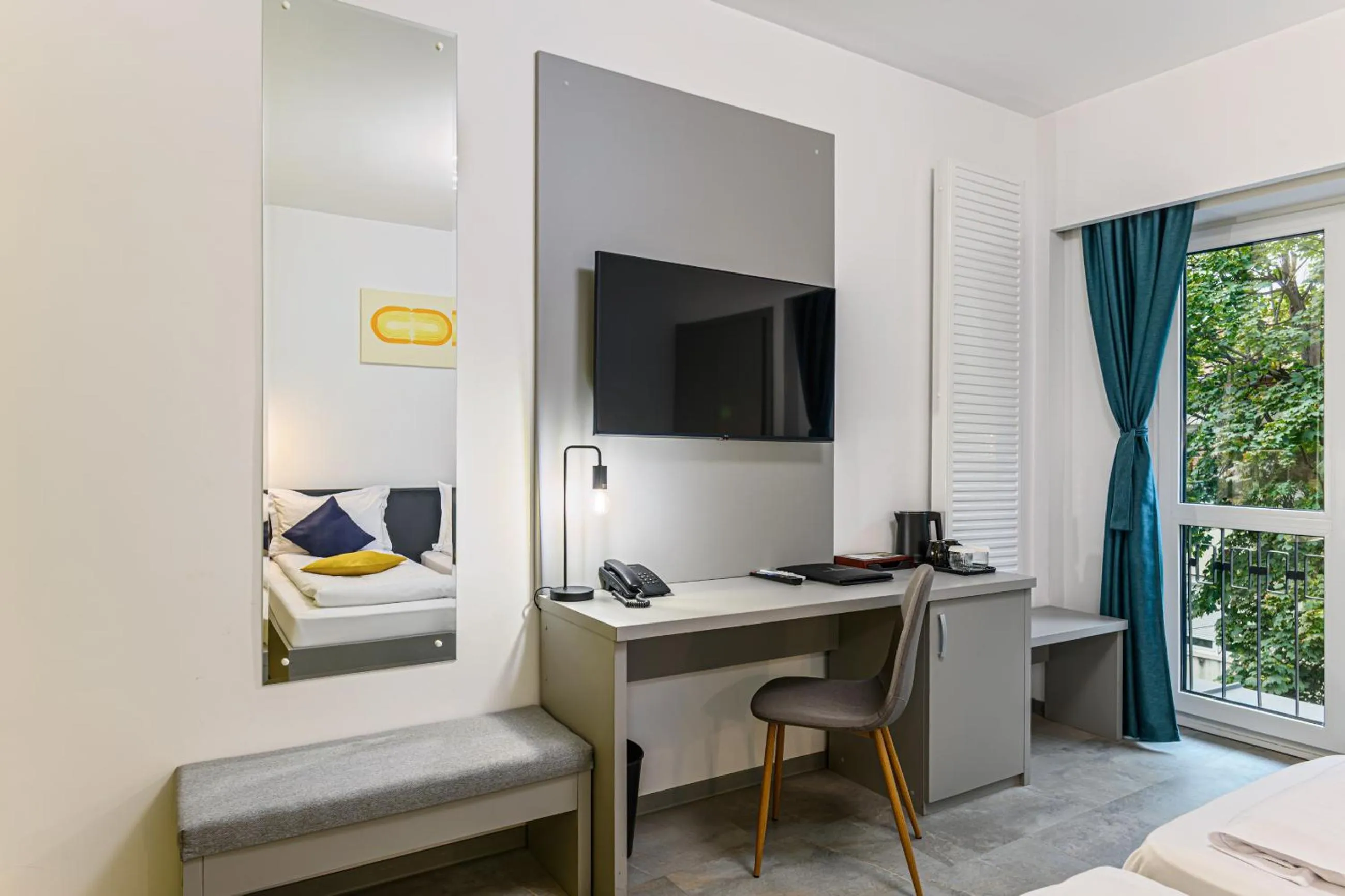 Bed in Johann Strauss Hotel