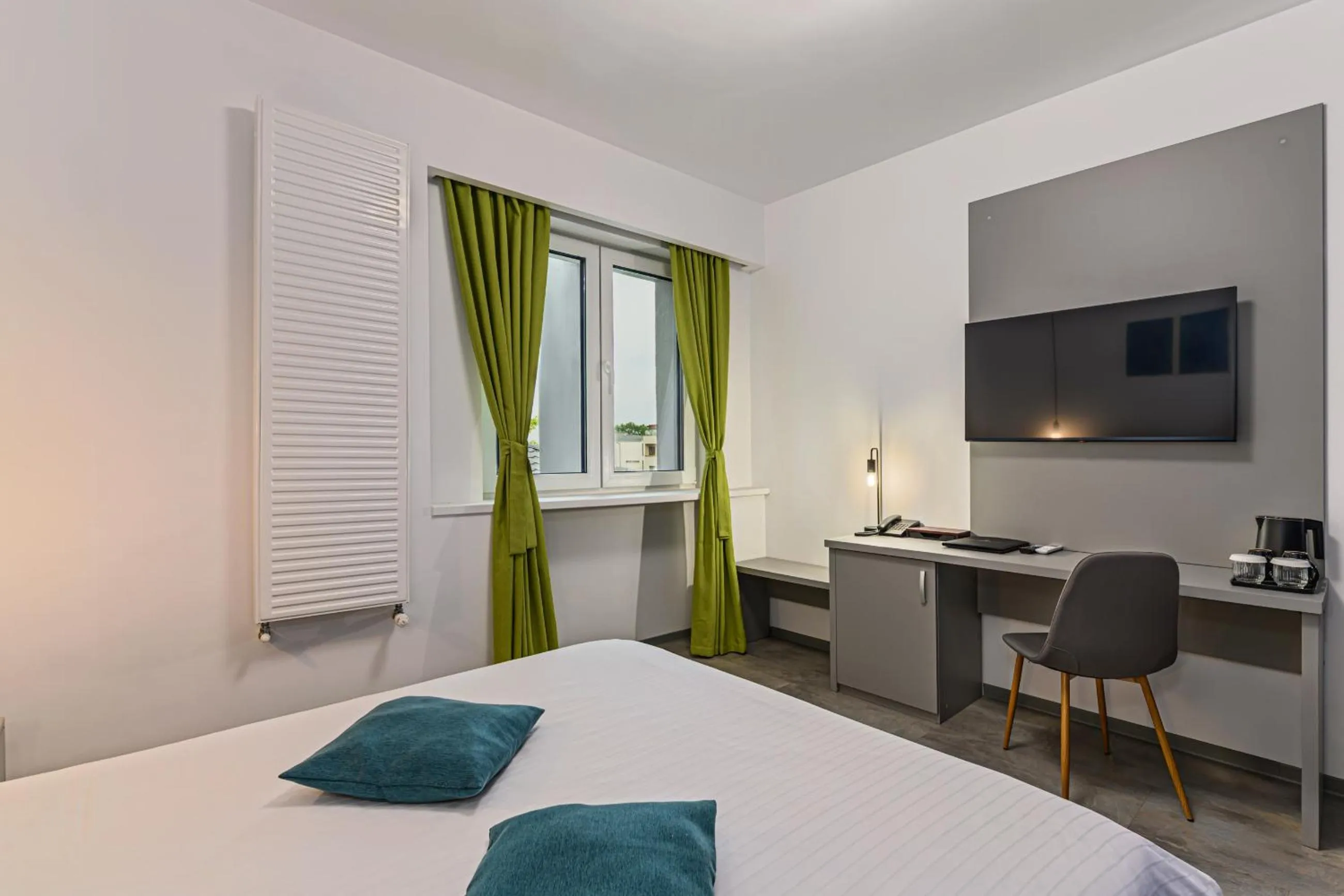 Bed in Johann Strauss Hotel