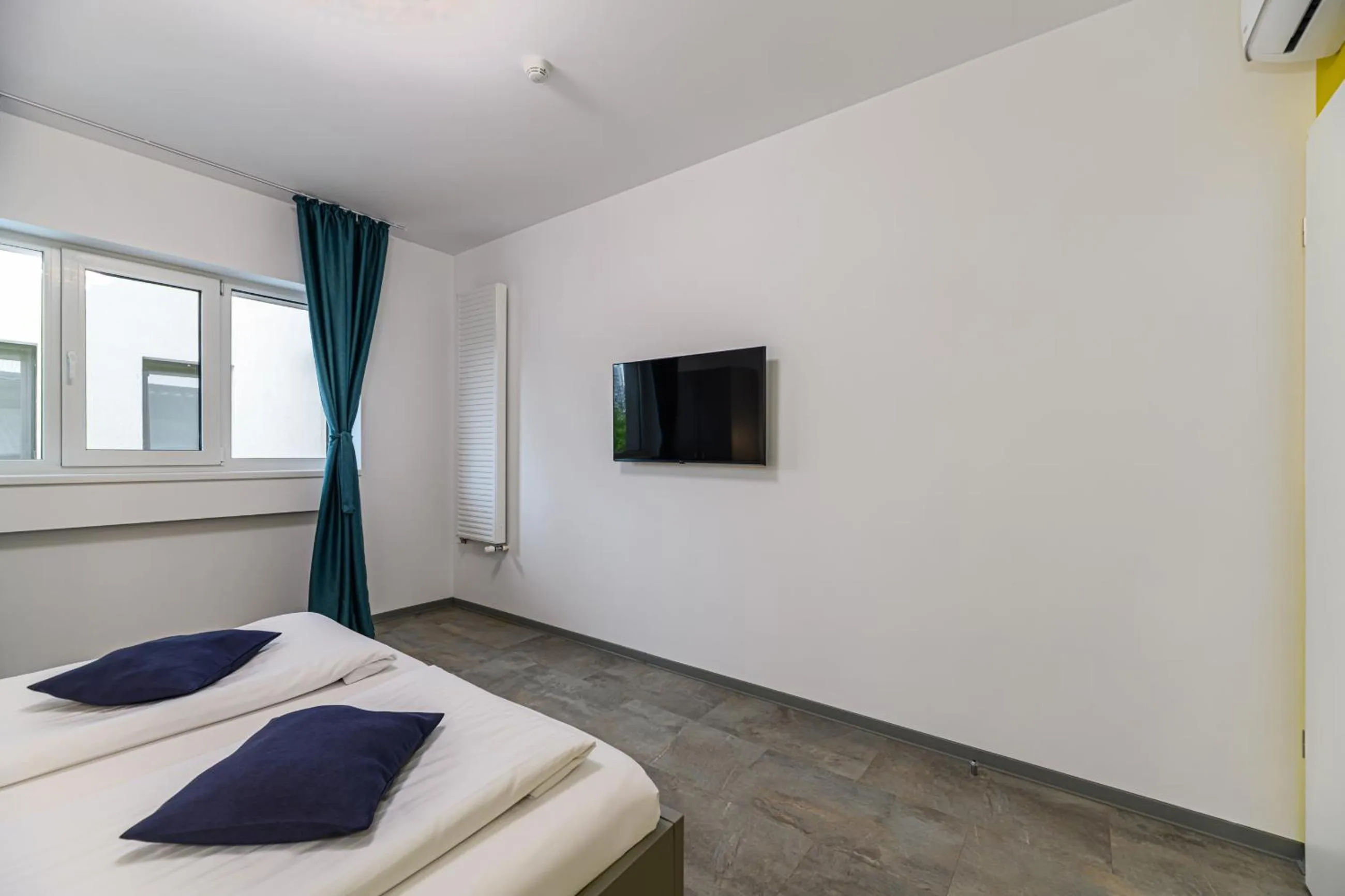 Bed in Johann Strauss Hotel