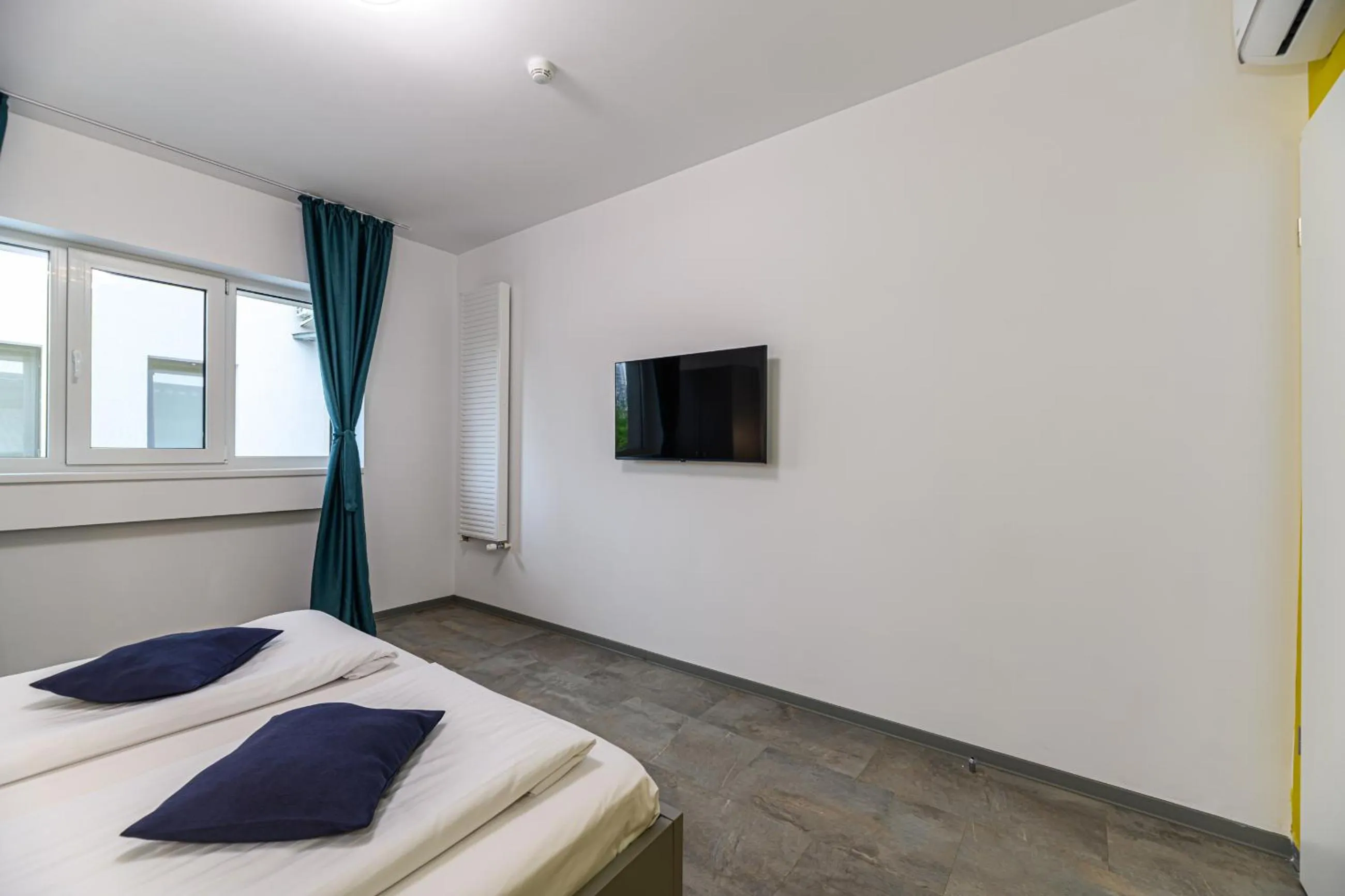 Bed in Johann Strauss Hotel