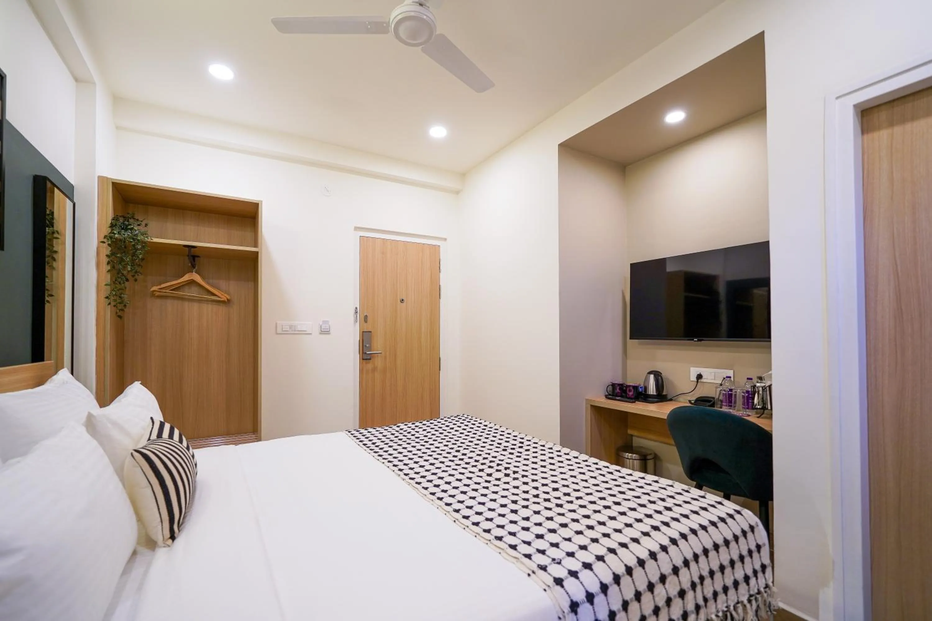 Bed in Olive Hotel Hoodi by Embassy Group