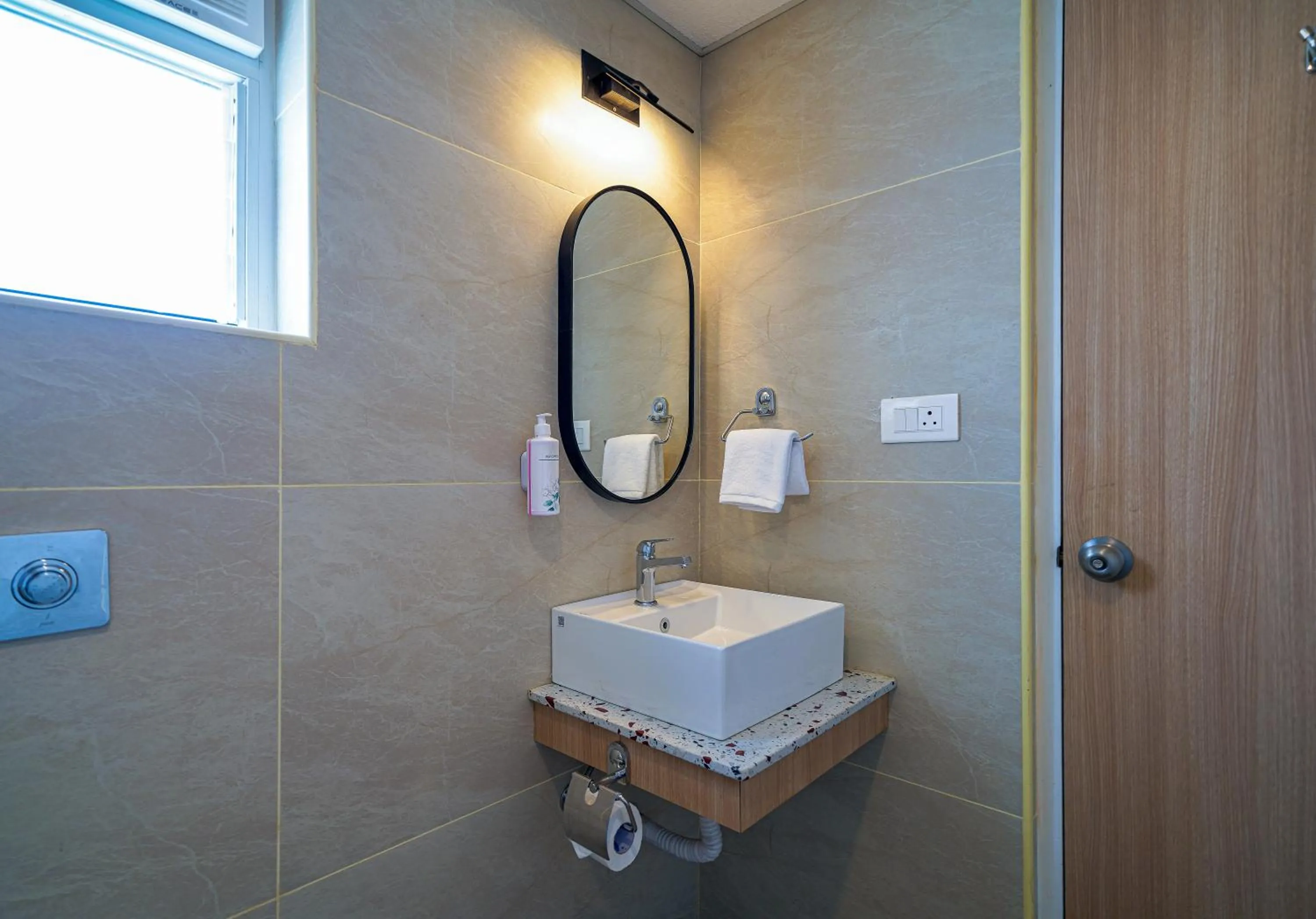 Bathroom in Olive Hotel Hoodi by Embassy Group