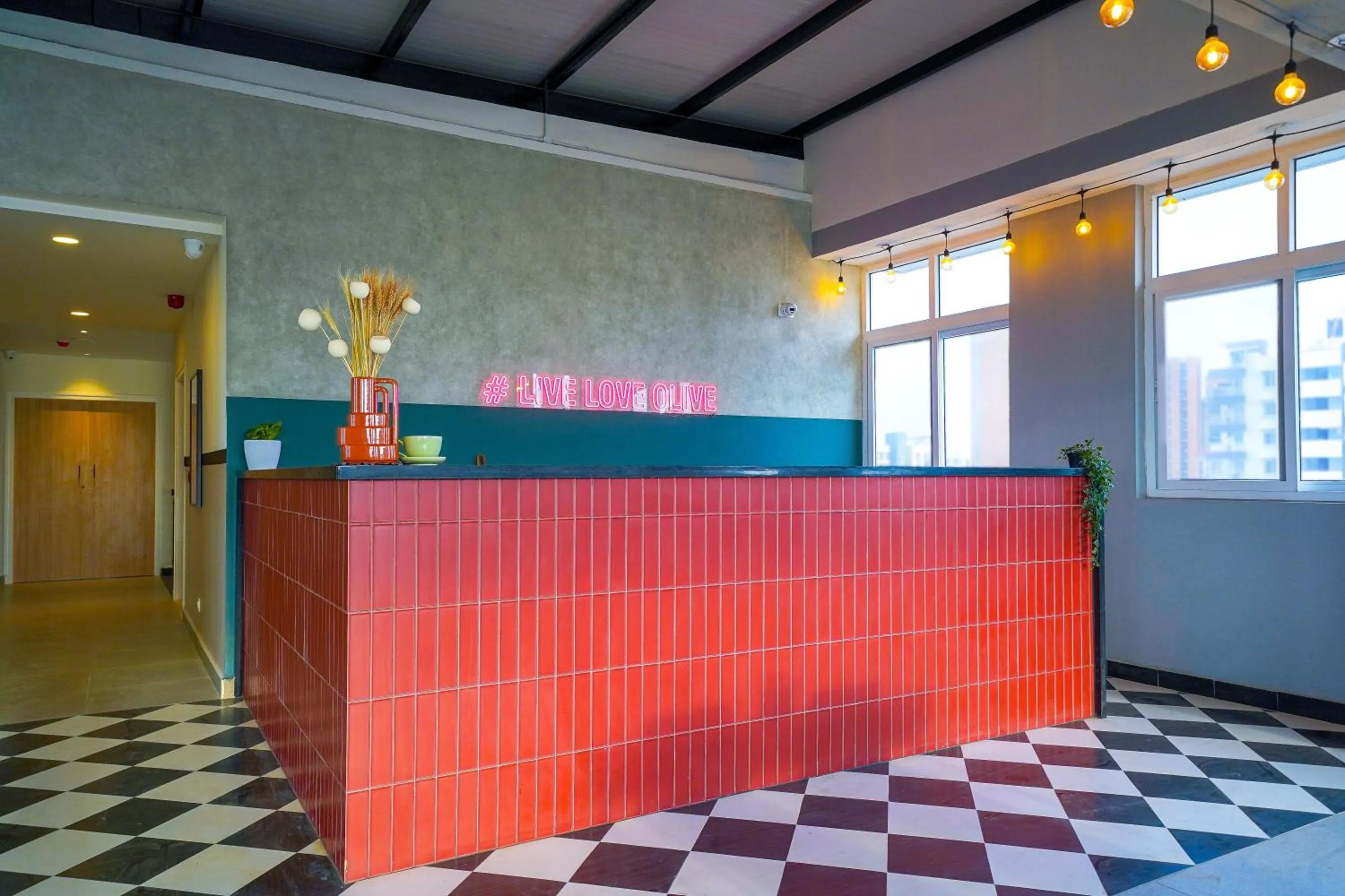 Lounge or bar in Olive Hotel Hoodi by Embassy Group