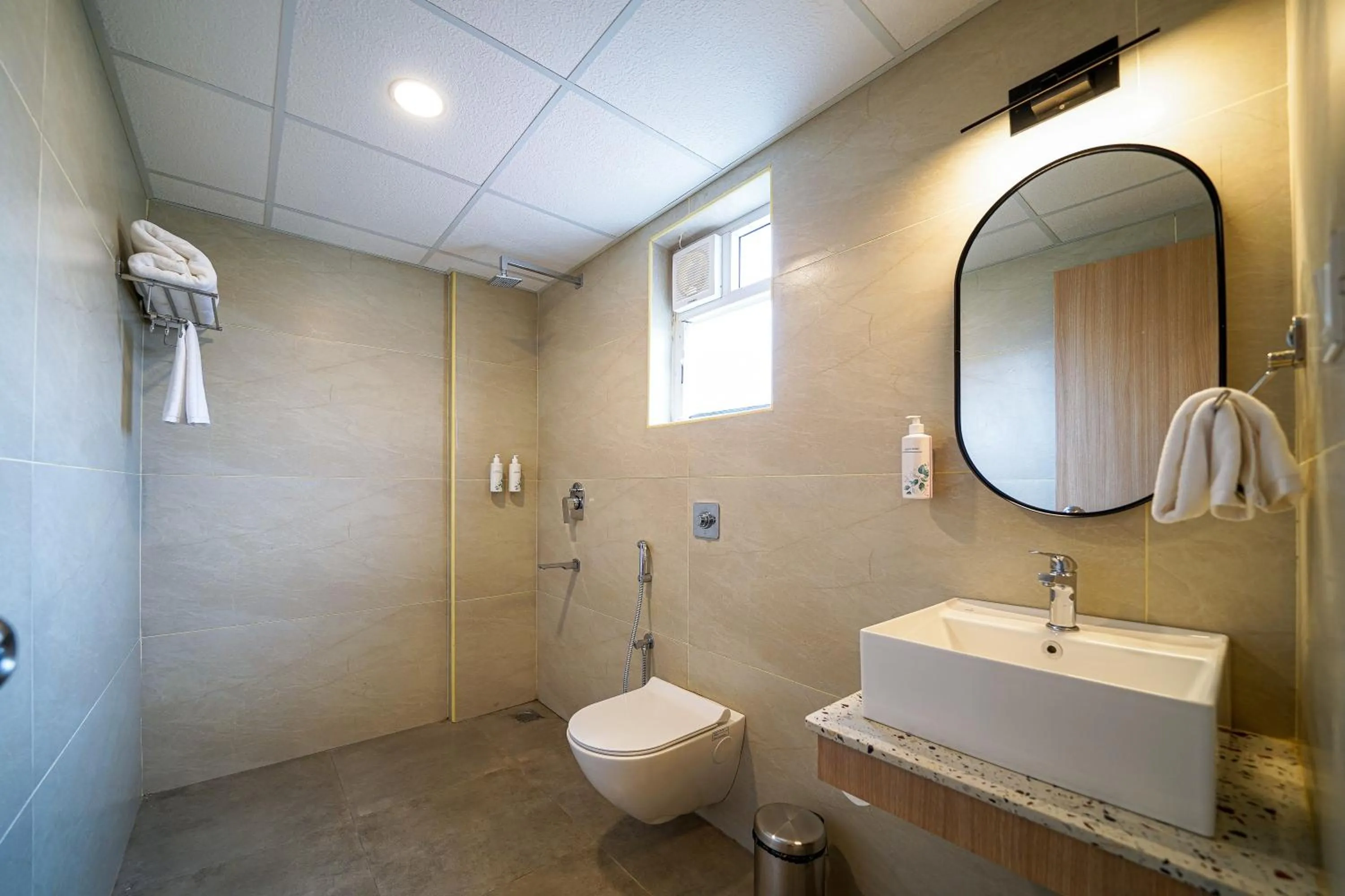 Toilet in Olive Hotel Hoodi by Embassy Group