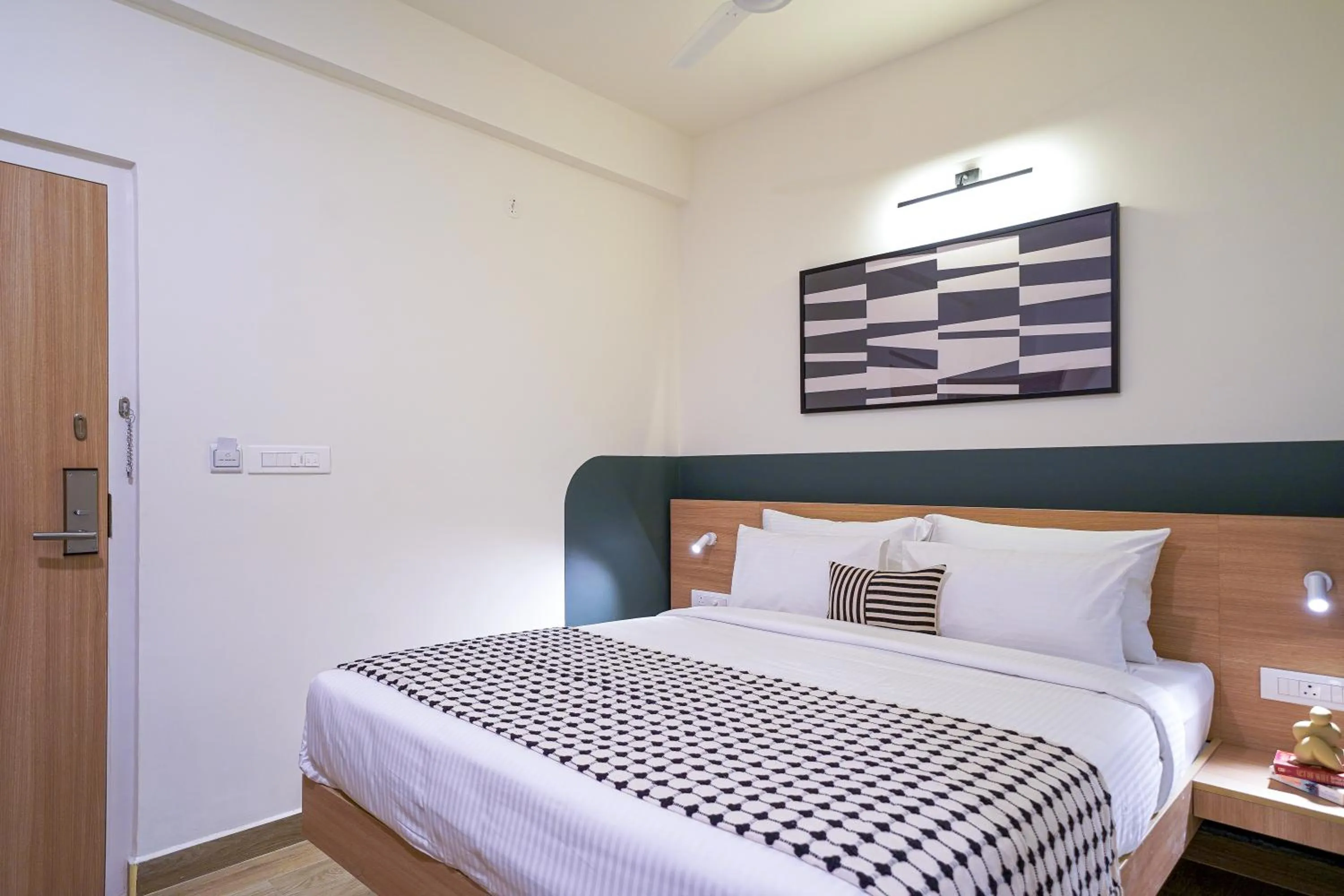 Bed in Olive Hotel Hoodi by Embassy Group