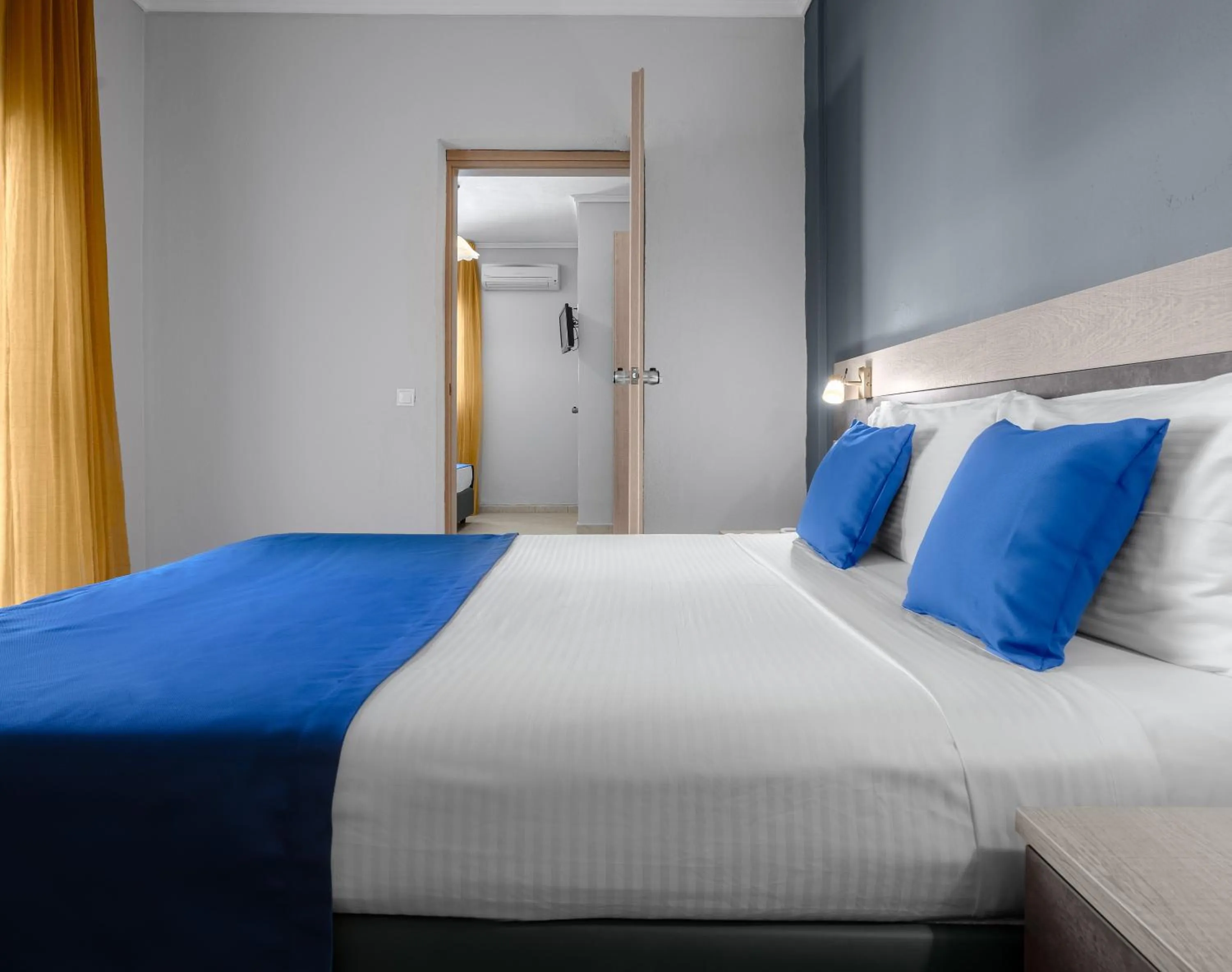 Bed in Stratos Hotel