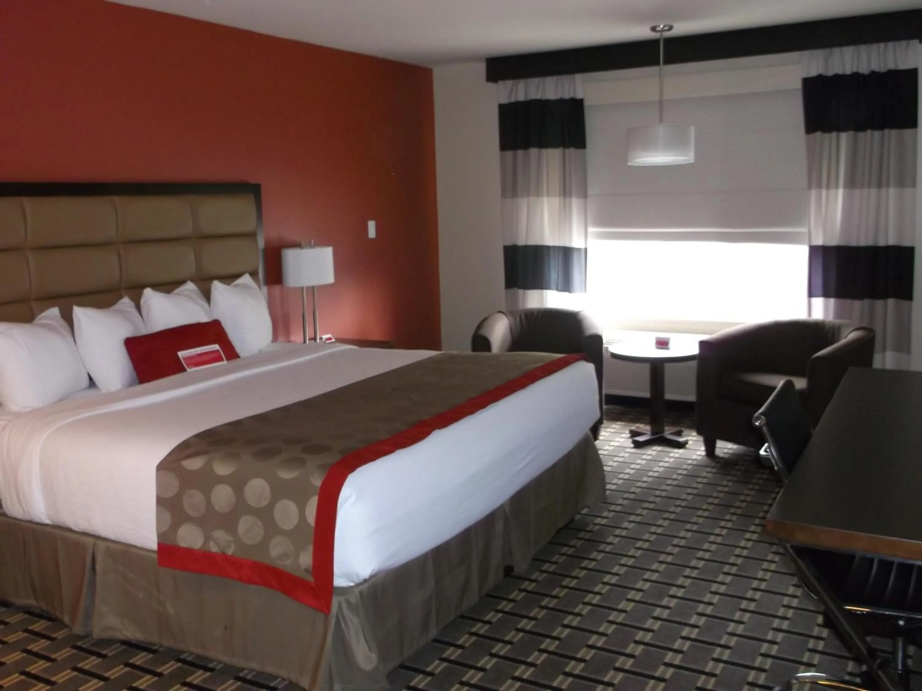 Coffee/tea facilities, Bed in Ramada by Wyndham Edson