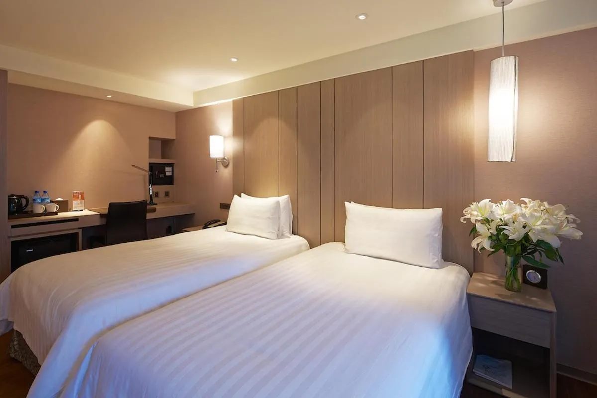 Bed in La Maison Hotel