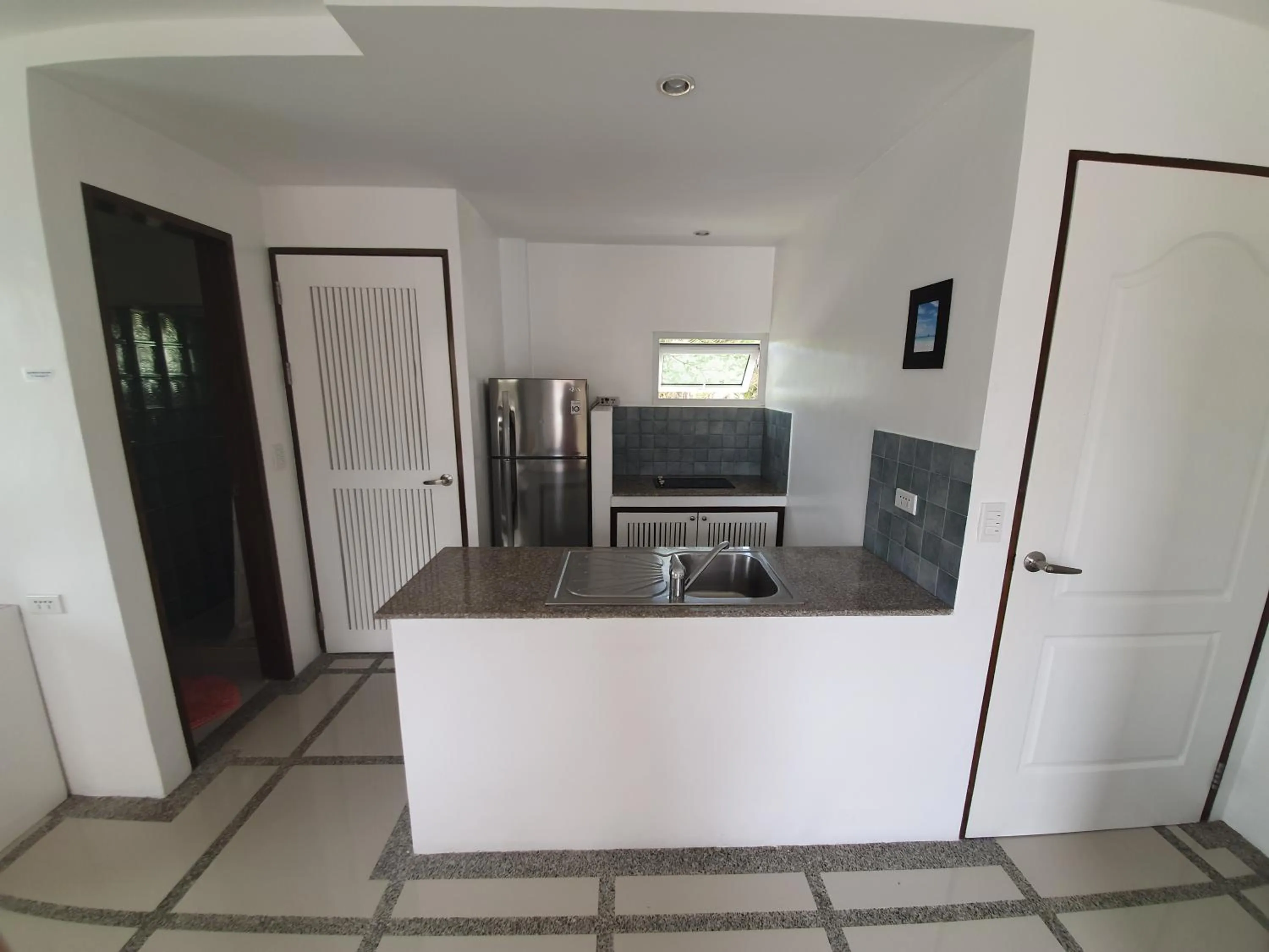 Kitchen or kitchenette in ClubBoracay Apartelle