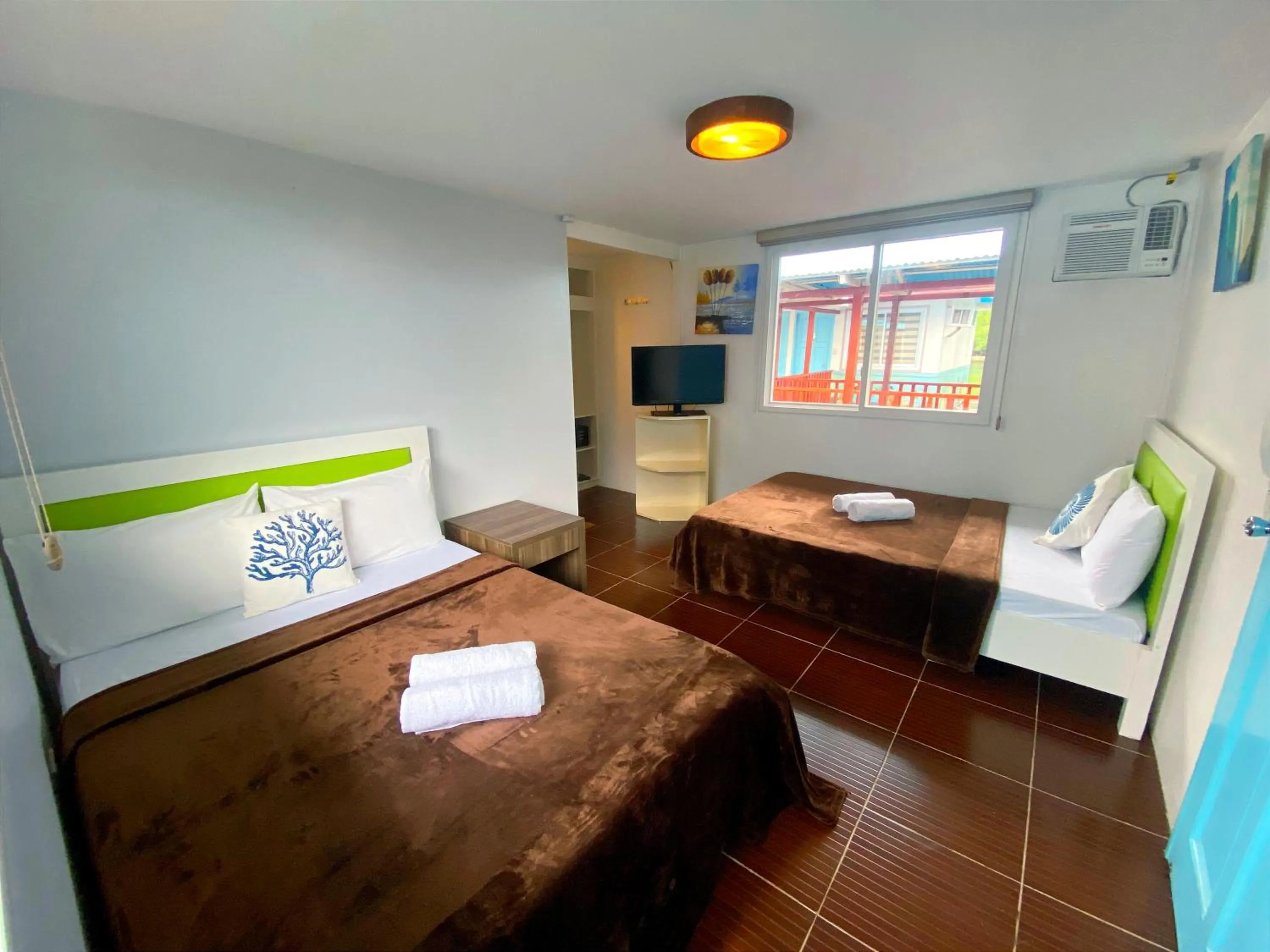 Photo of the whole room, Bed in Coron Underwater Garden Resort