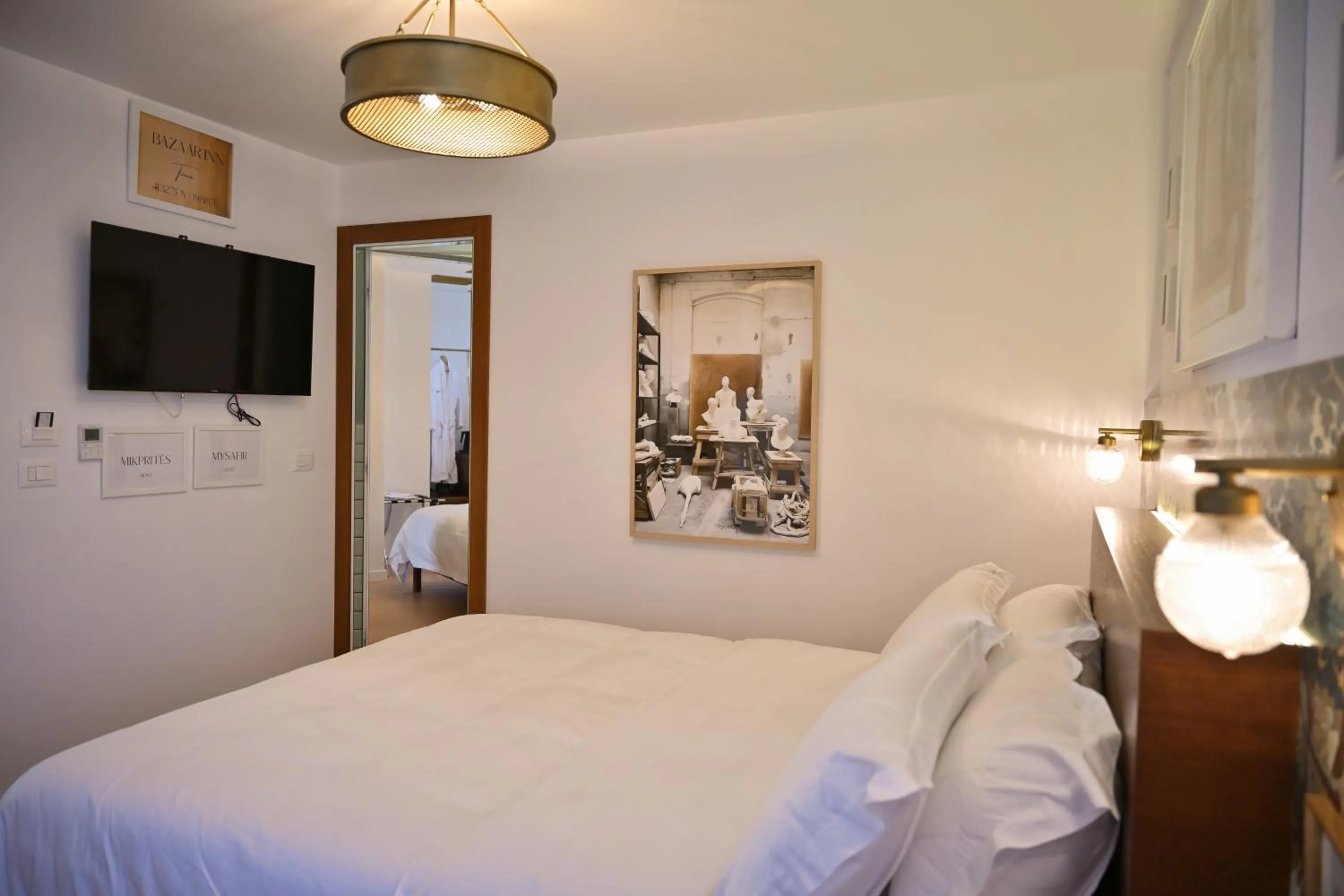 Bed in Bazaar Inn Hotel