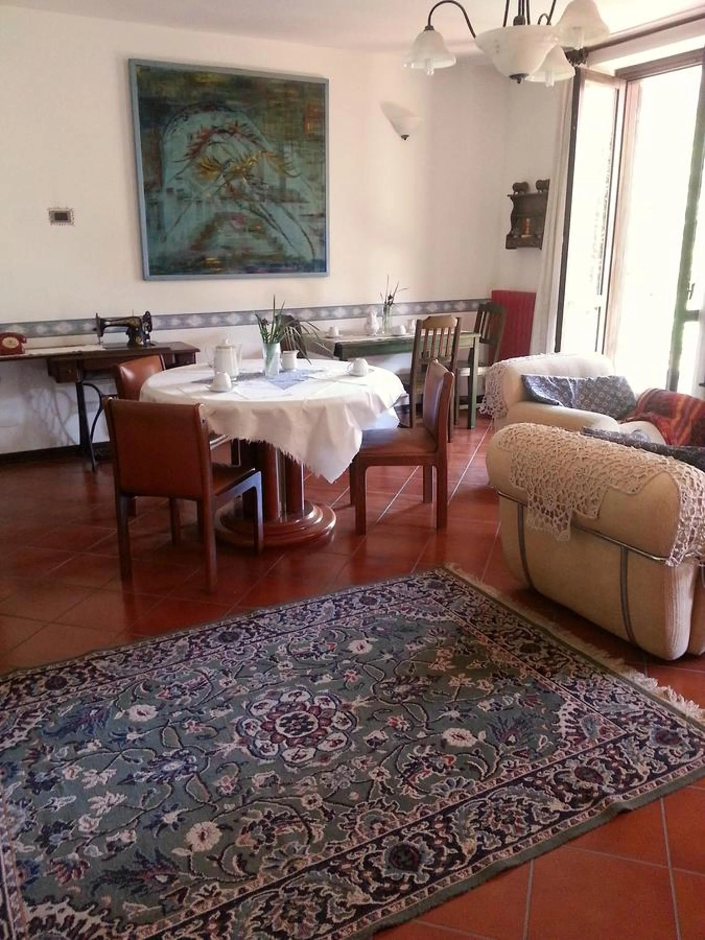 Communal lounge/ TV room in Il Nido del Pettirosso