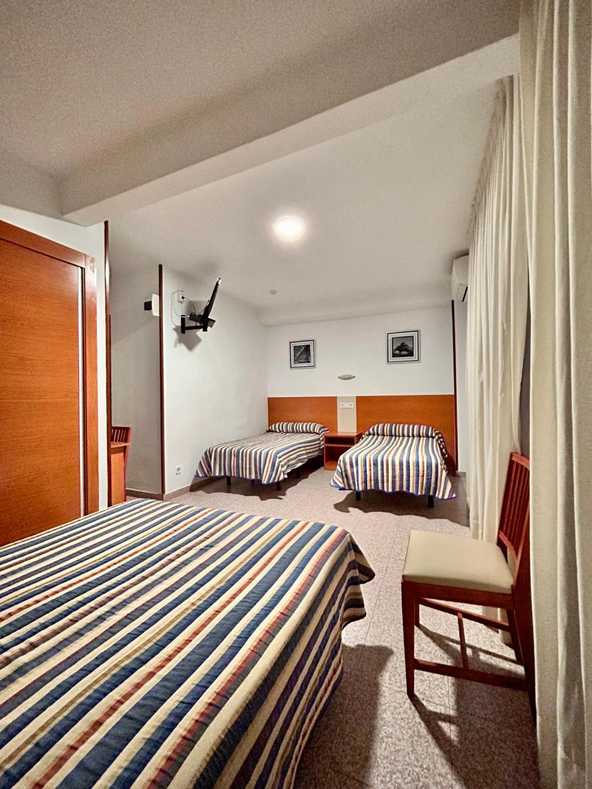 Bed in Pensión La Orozca Benidorm