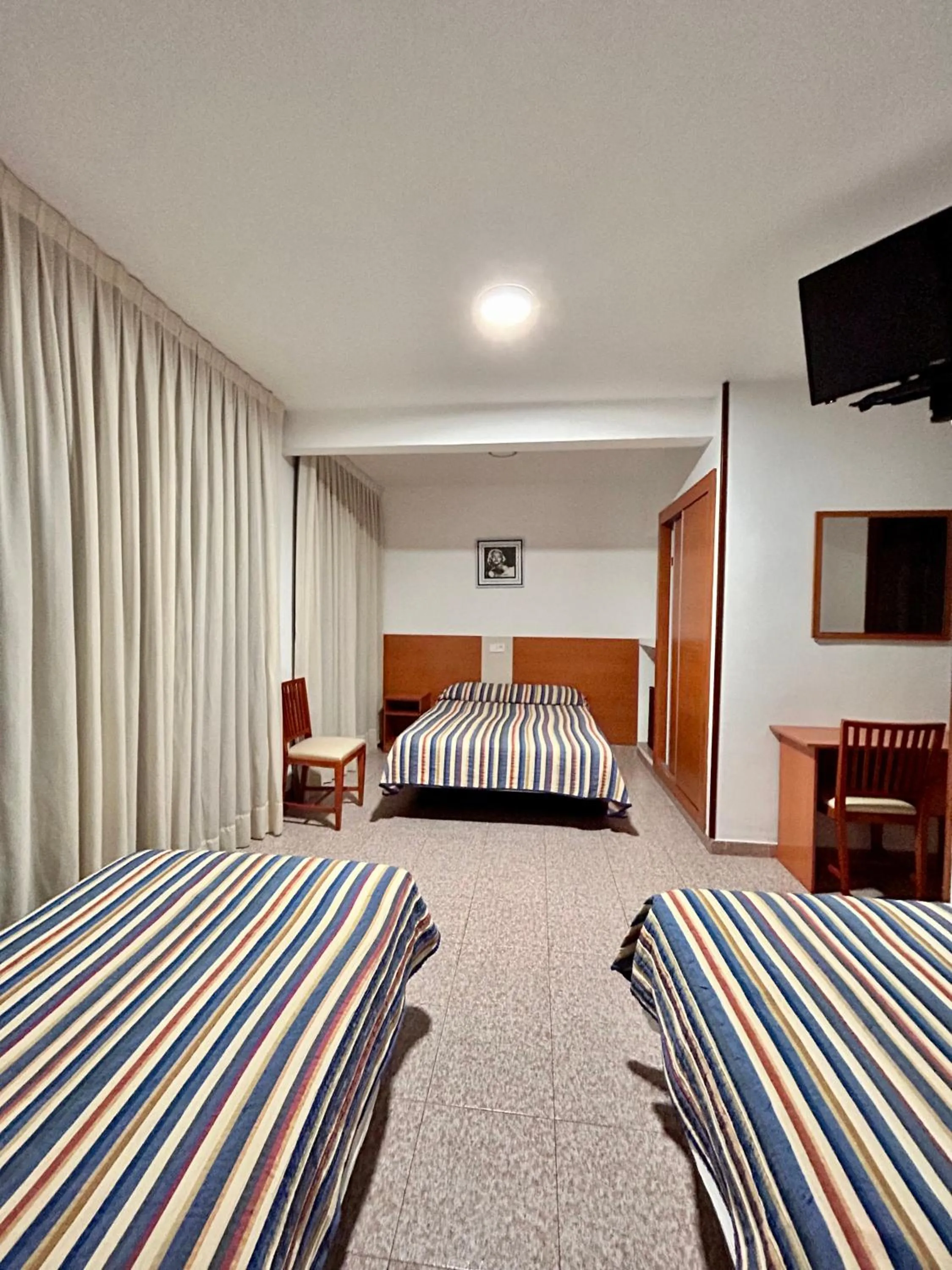 Bed in Pensión La Orozca Benidorm