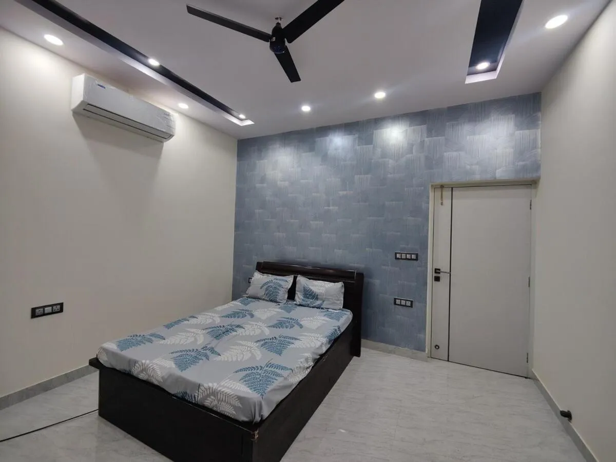 Bed in Luxurious & Elegant 1BHK Retreat