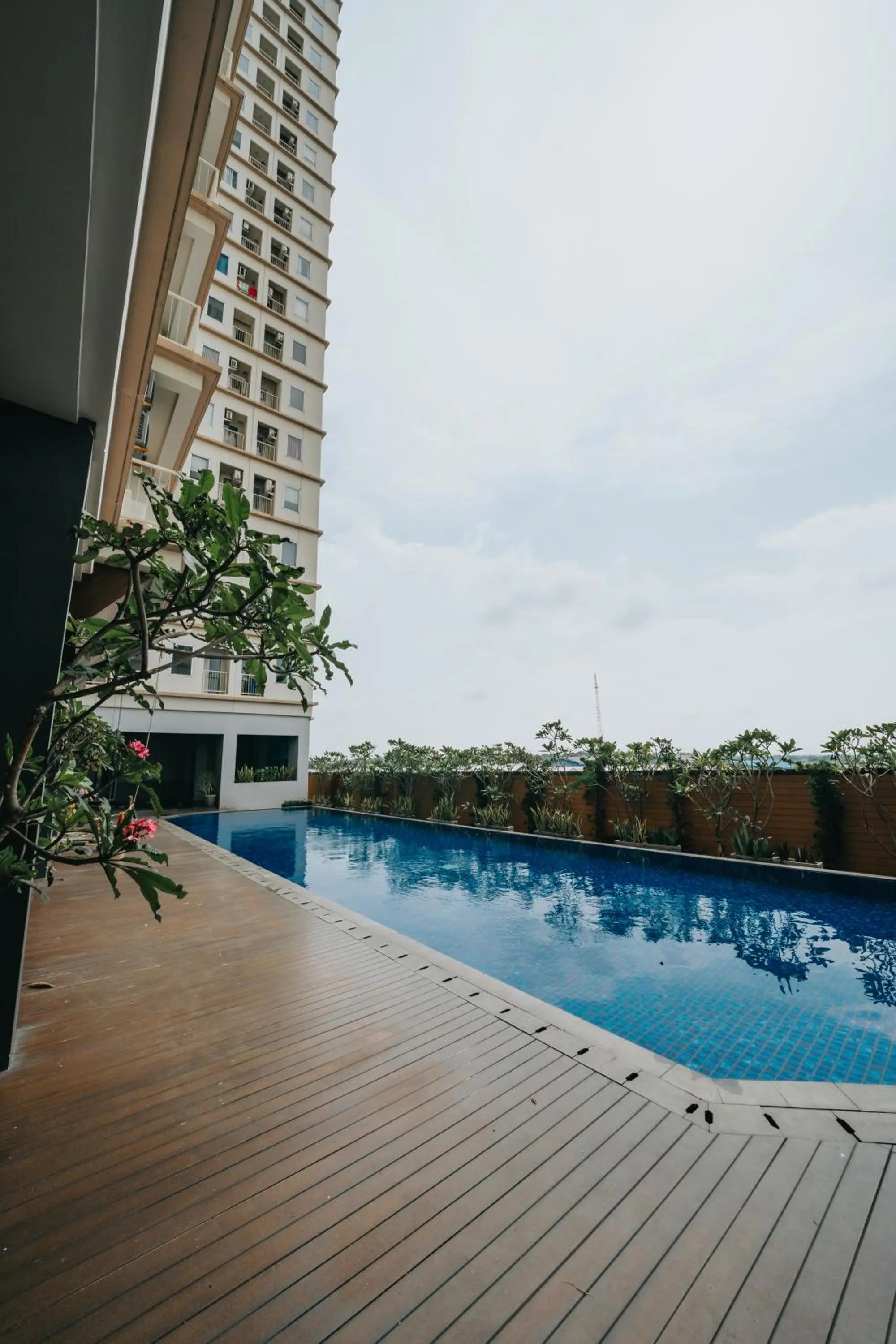 Pool view in Tmansari Mahogany Apartement By Cozy