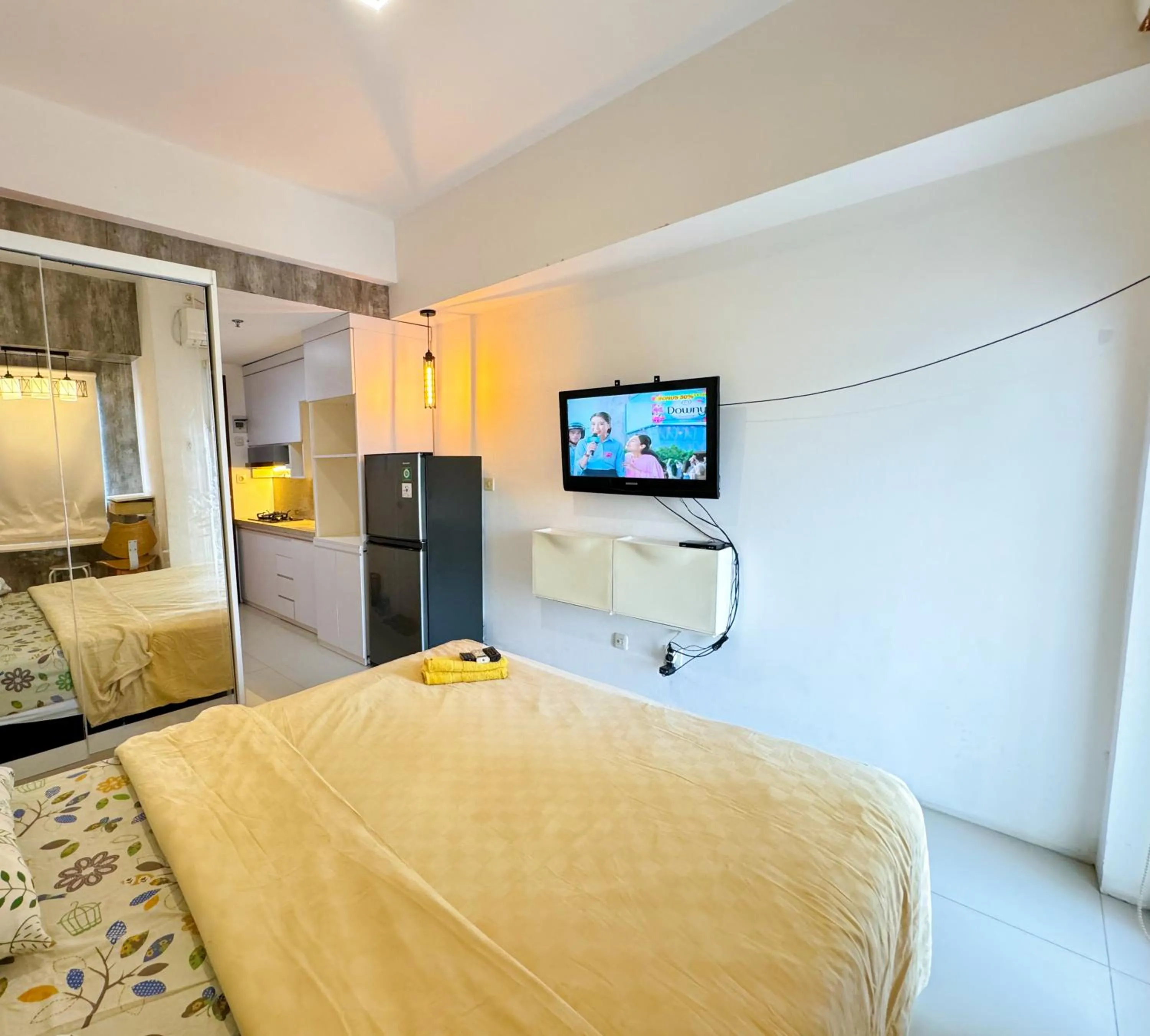 Bedroom, Bed in Tmansari Mahogany Apartement By Cozy