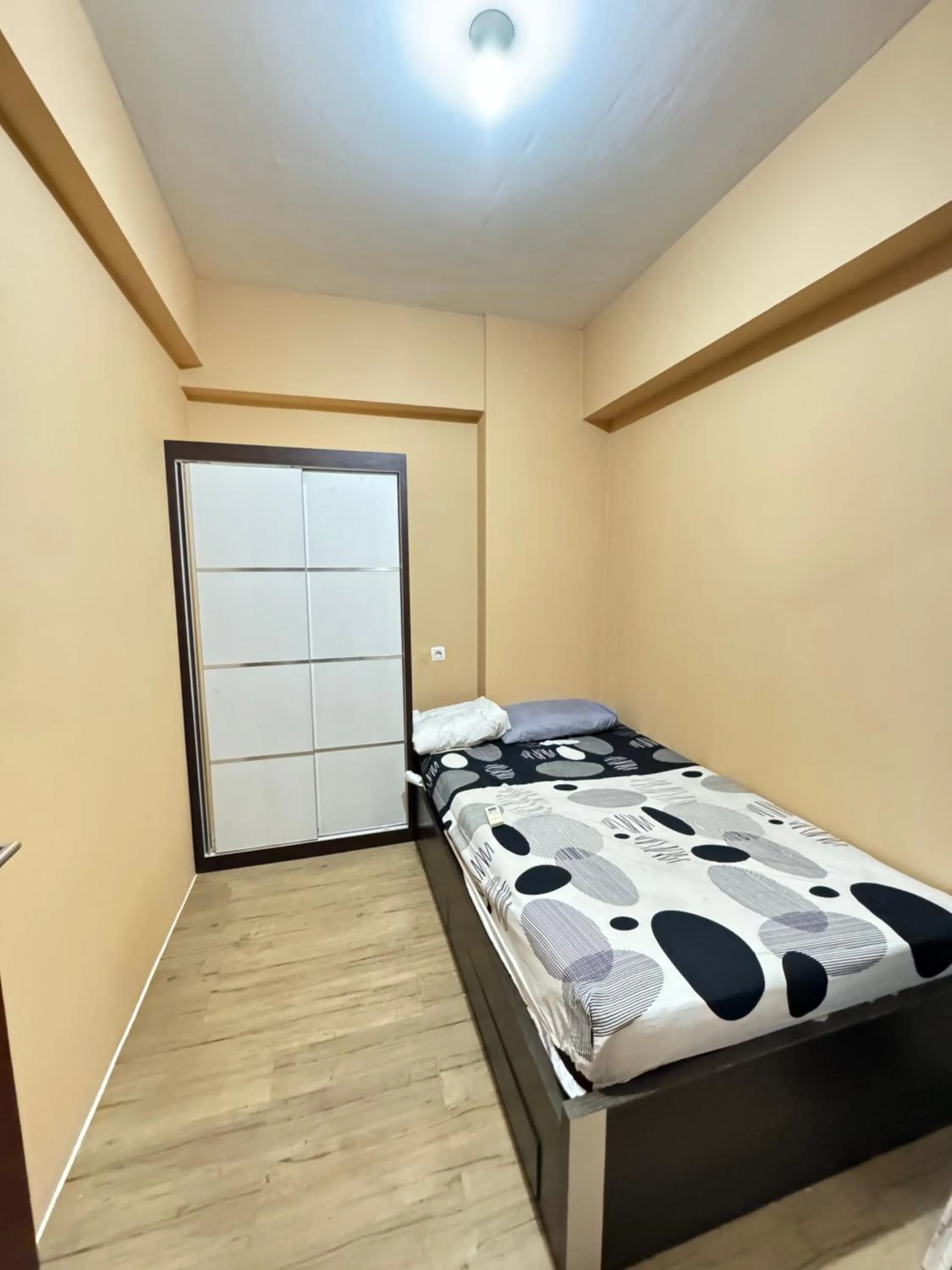 Bedroom, Bed in Tmansari Mahogany Apartement By Cozy