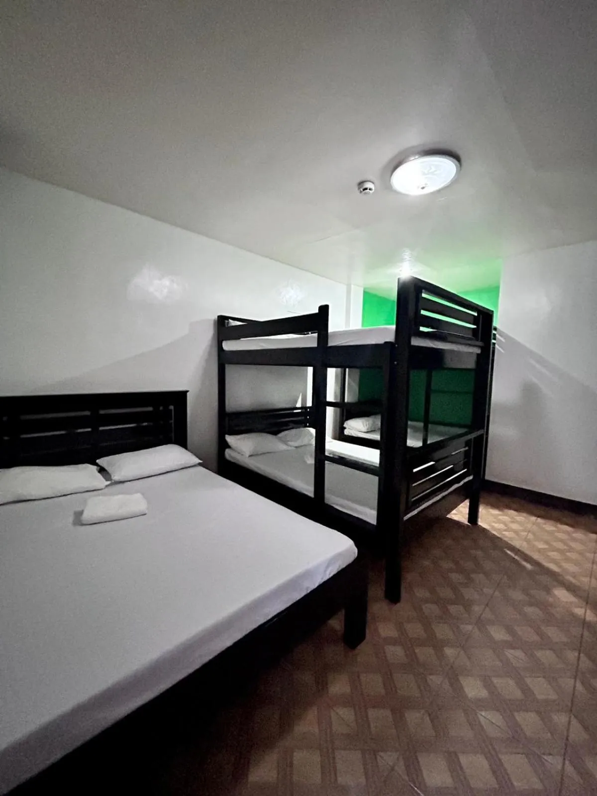 Bed in KNB West Villa Inn by SMS Hospitality