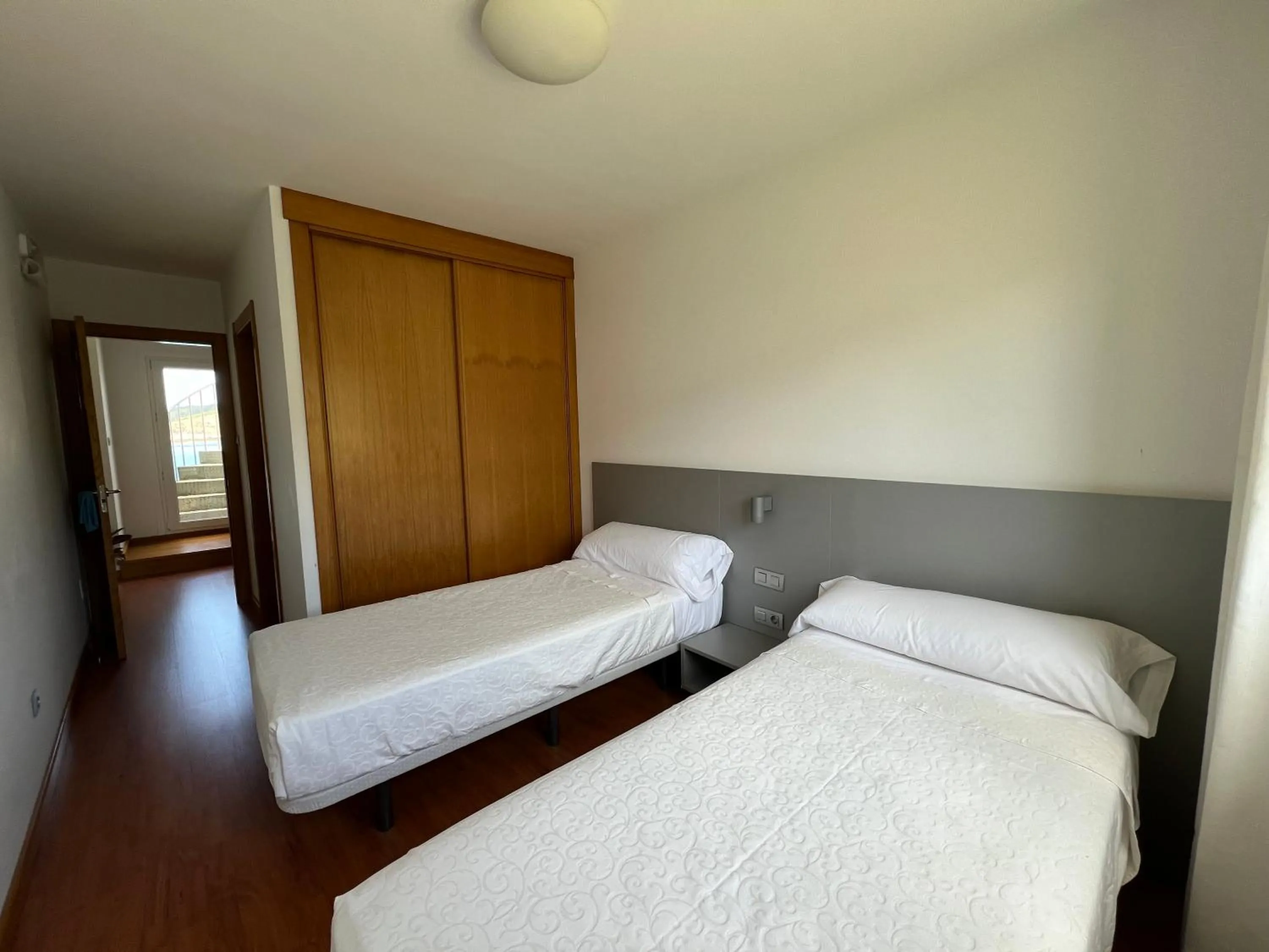 Bed in Porto Cabana by Miramar Stays