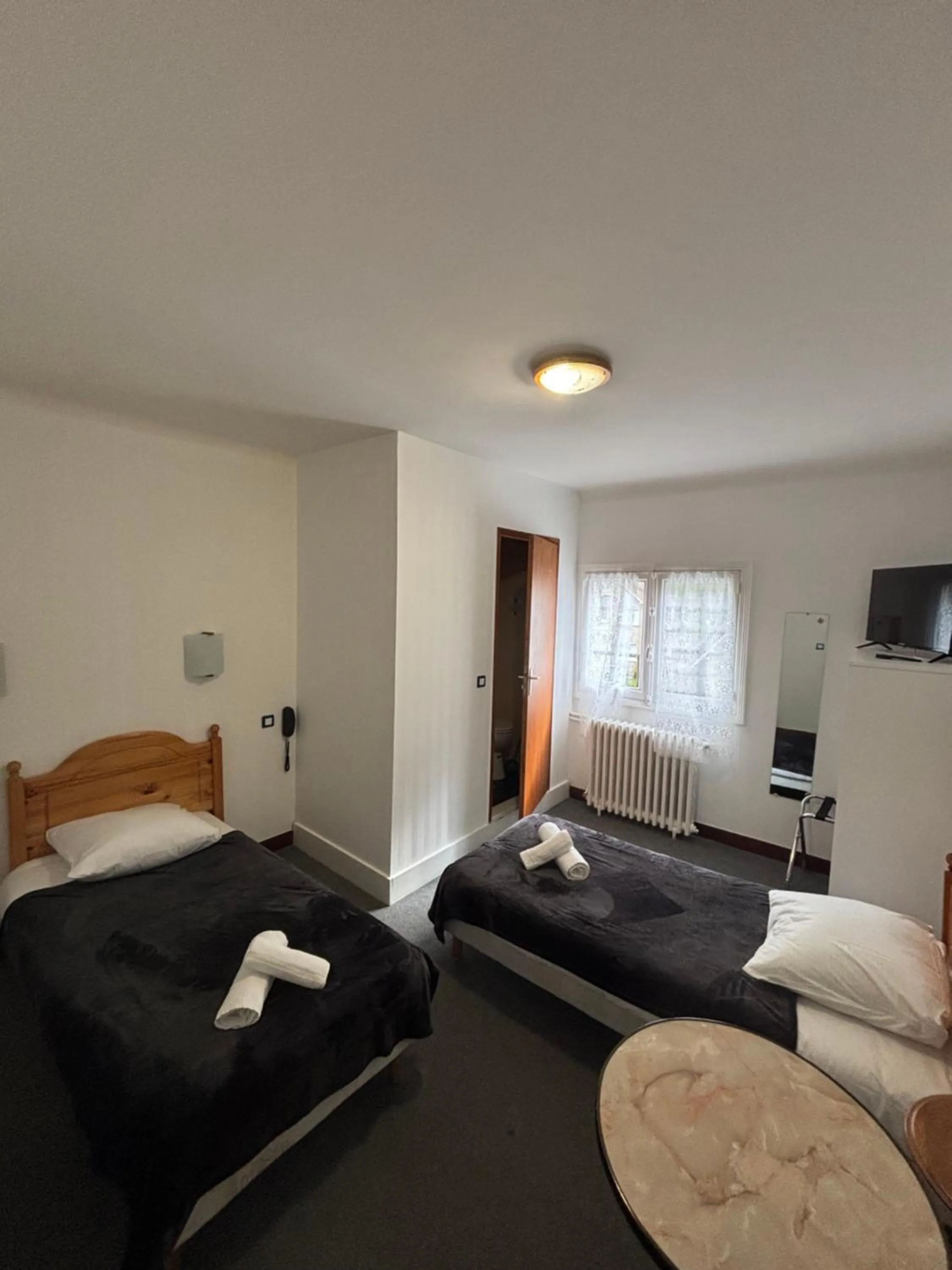 Bed in Hotel le Taillon