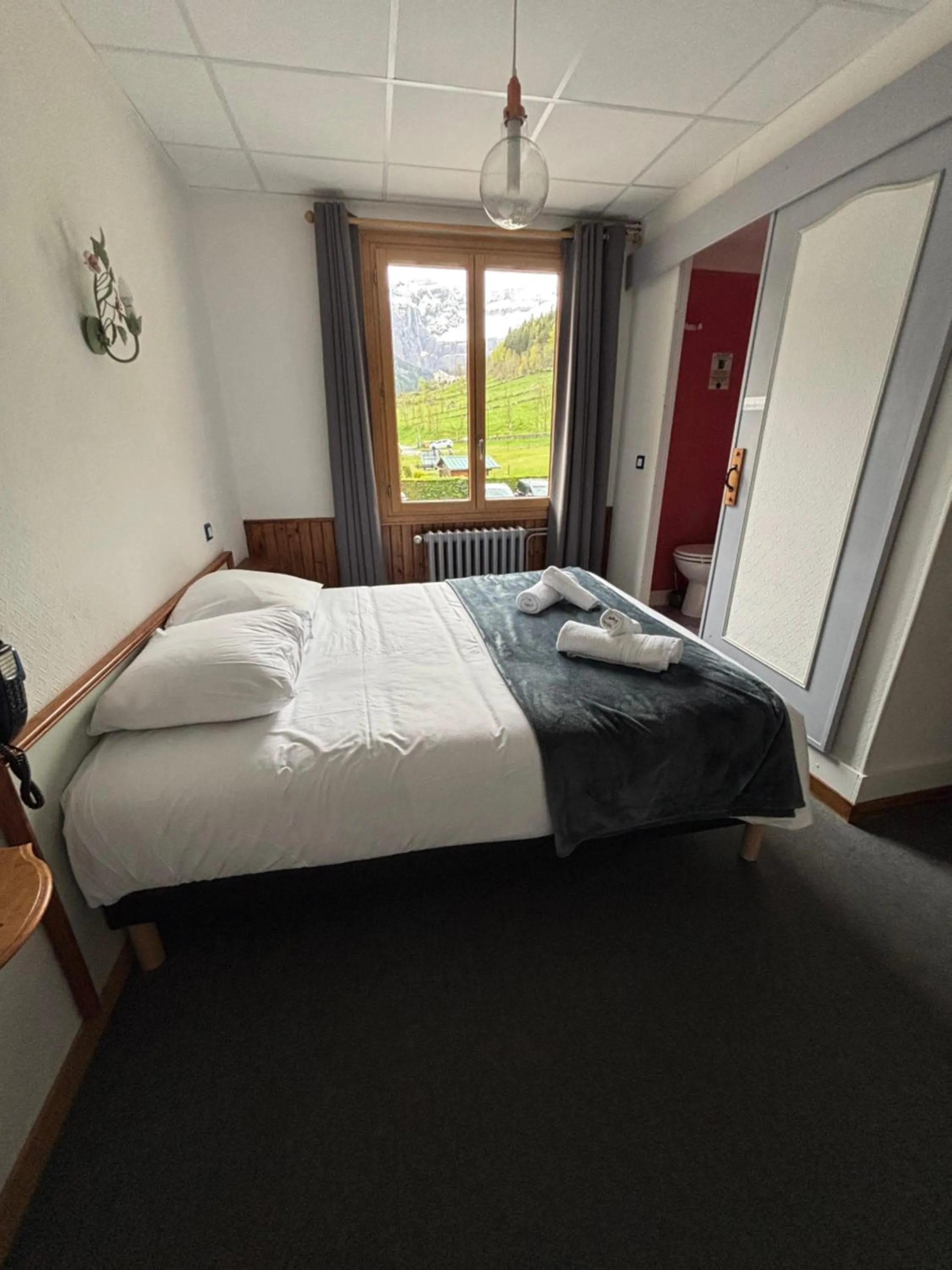 Bed in Hotel le Taillon