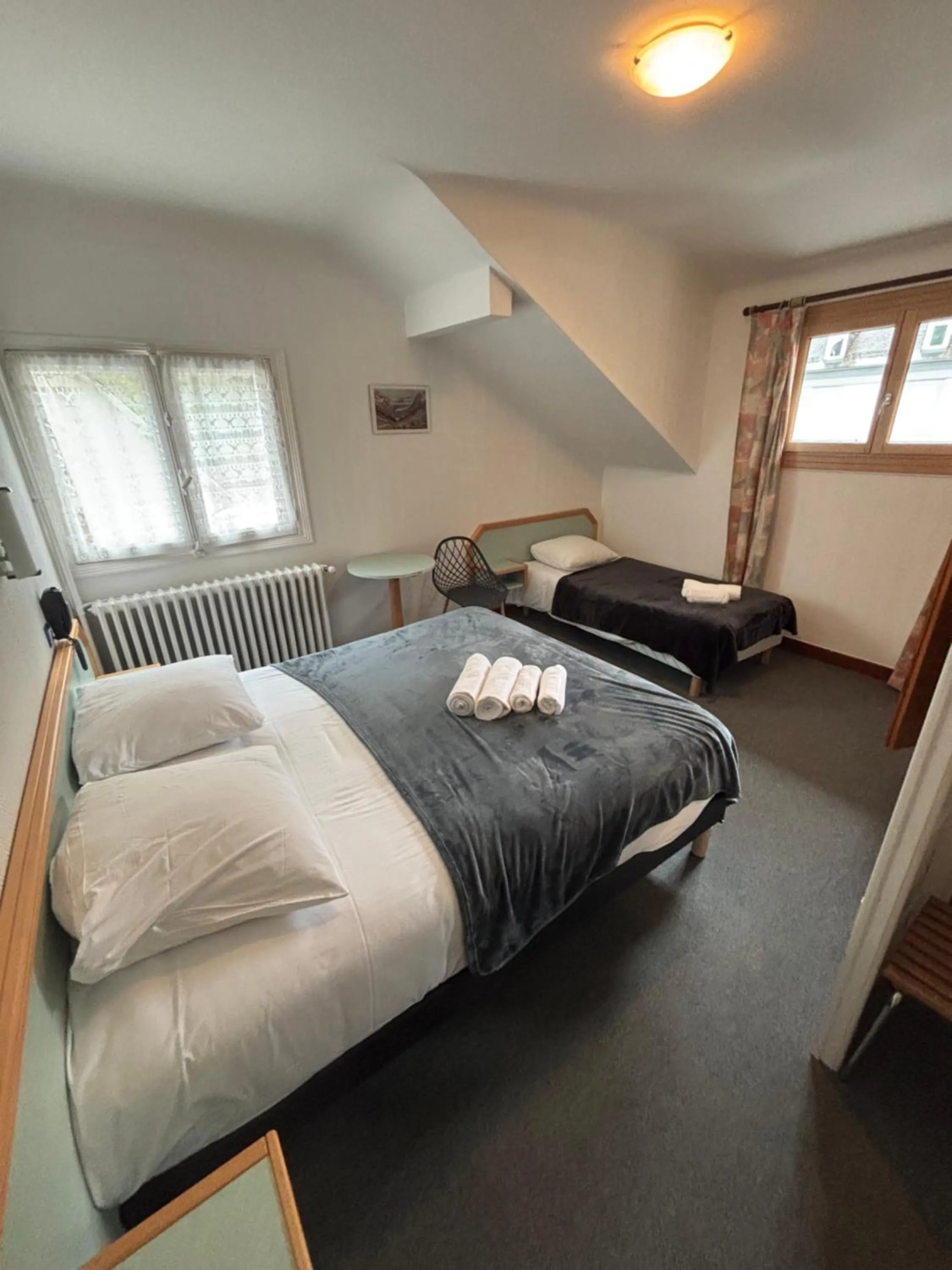 Bed in Hotel le Taillon