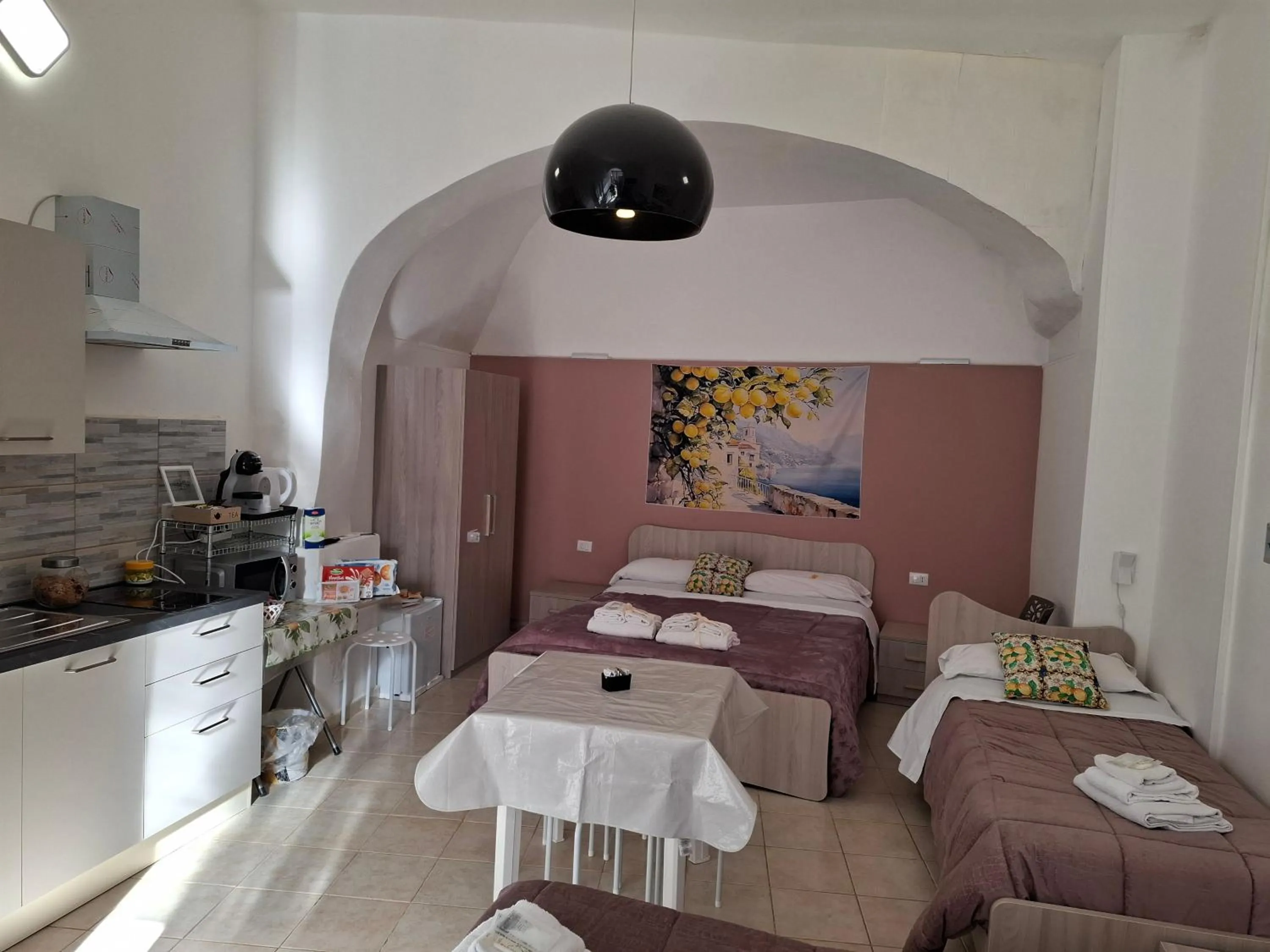 Photo of the whole room, Bed in B&B Le Lumìe " Bed end Kitchen"