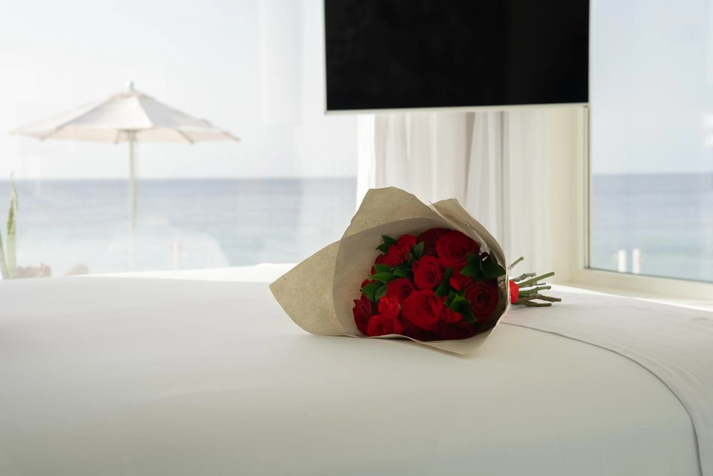 Bed in Lani's Suites de Luxe - Adults Only