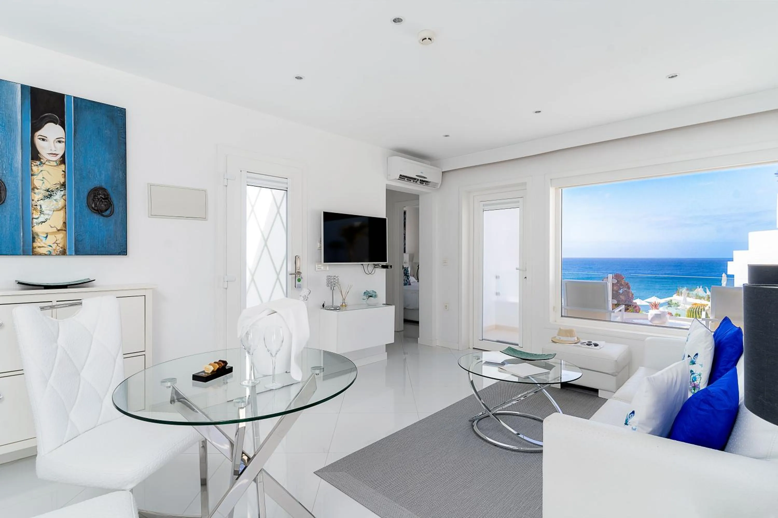 Communal lounge/ TV room in Lani's Suites de Luxe - Adults Only