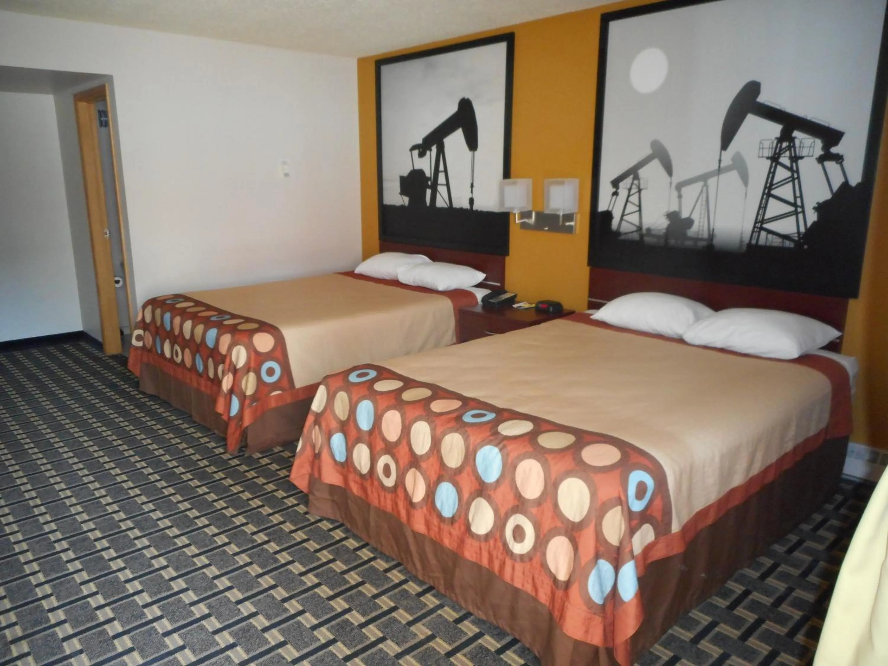 Bathroom, Bed in Super 8 by Wyndham Fox Creek