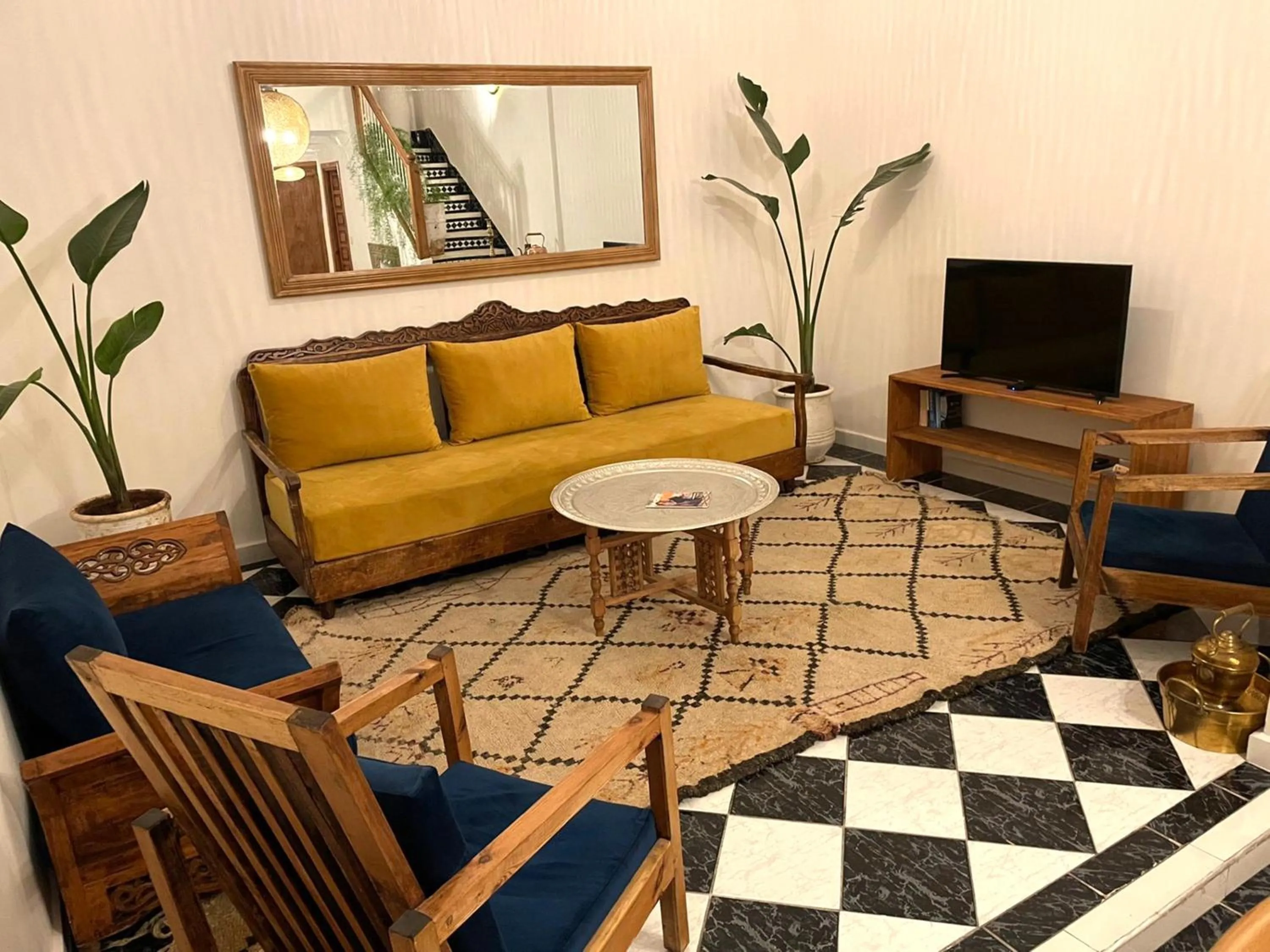 Communal lounge/ TV room in Riad with 3 Swimming Pools