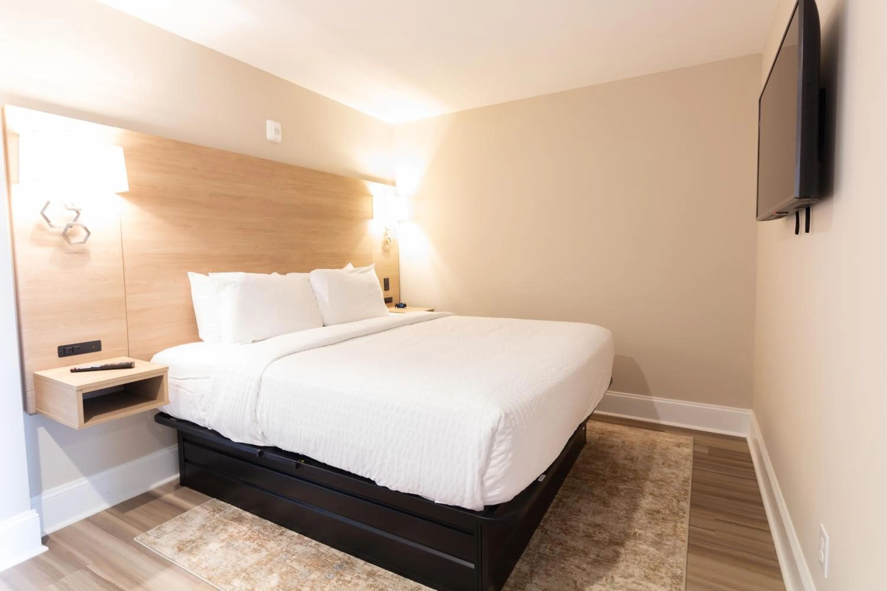 Bed in Bask Hotel at Big Rock Landing