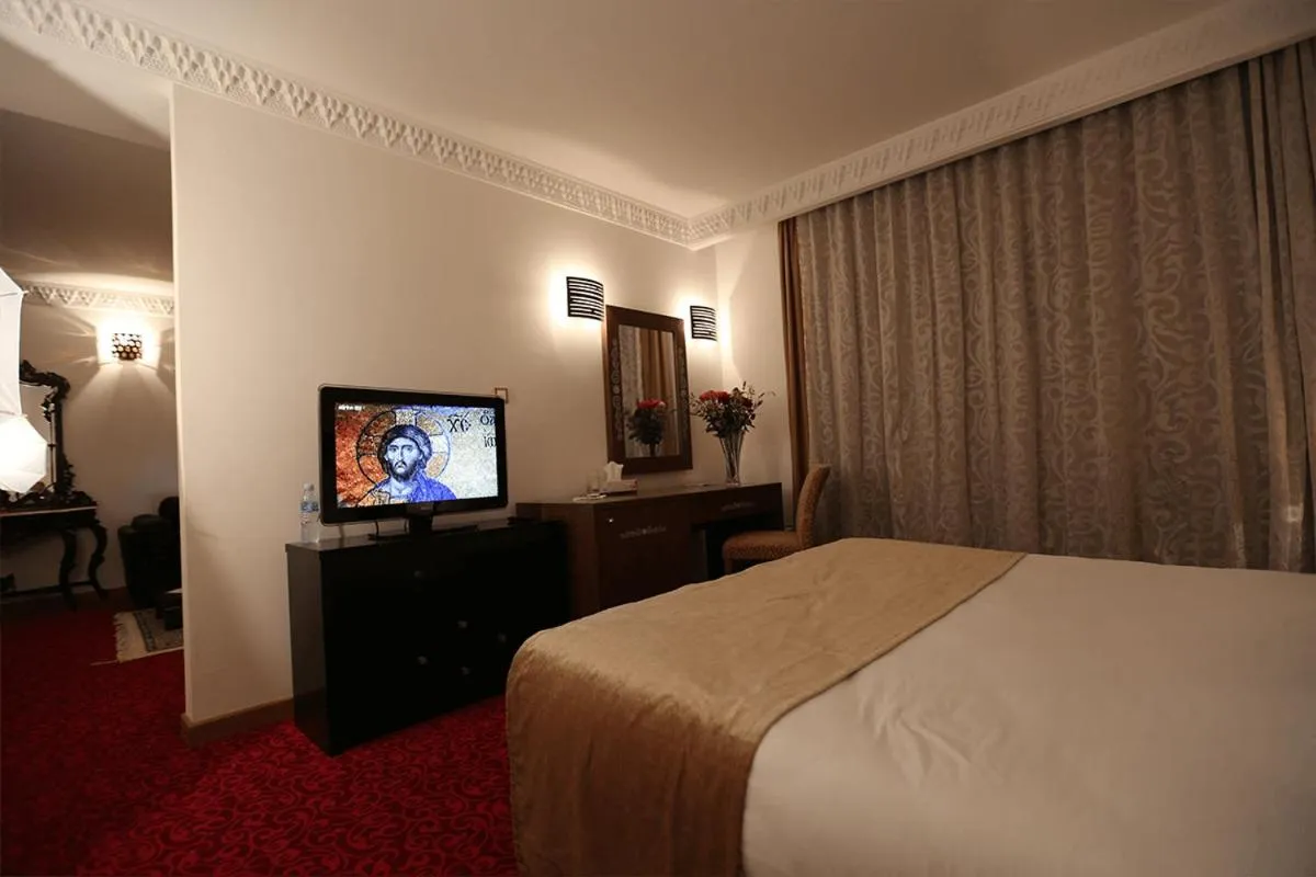 Bed in Le Caid Hotel