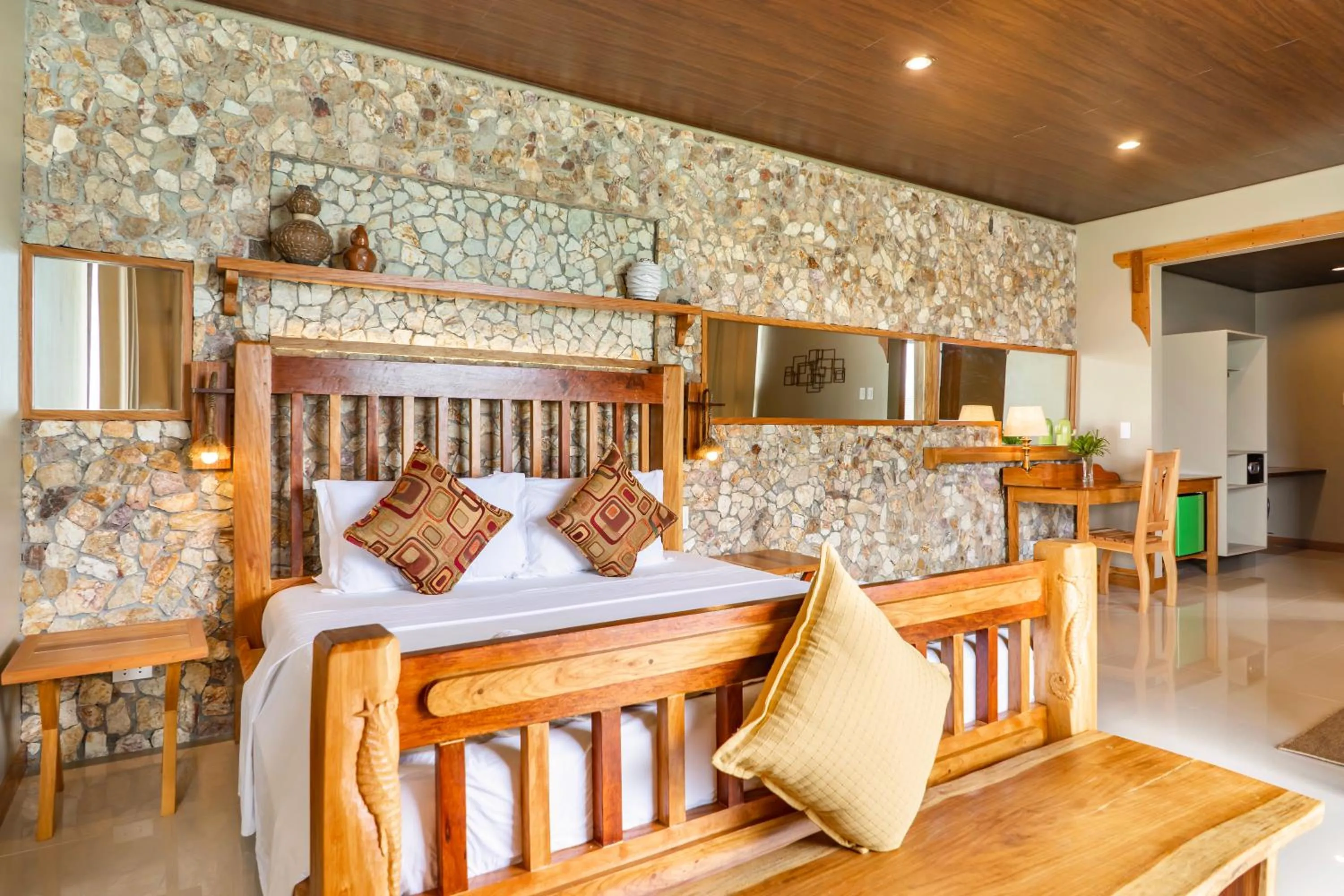 Photo of the whole room, Bed in La Estancia Busuanga