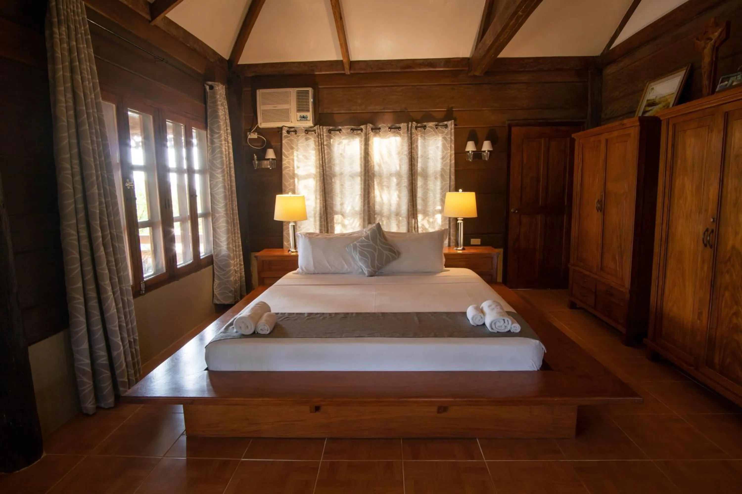 Photo of the whole room, Bed in La Estancia Busuanga
