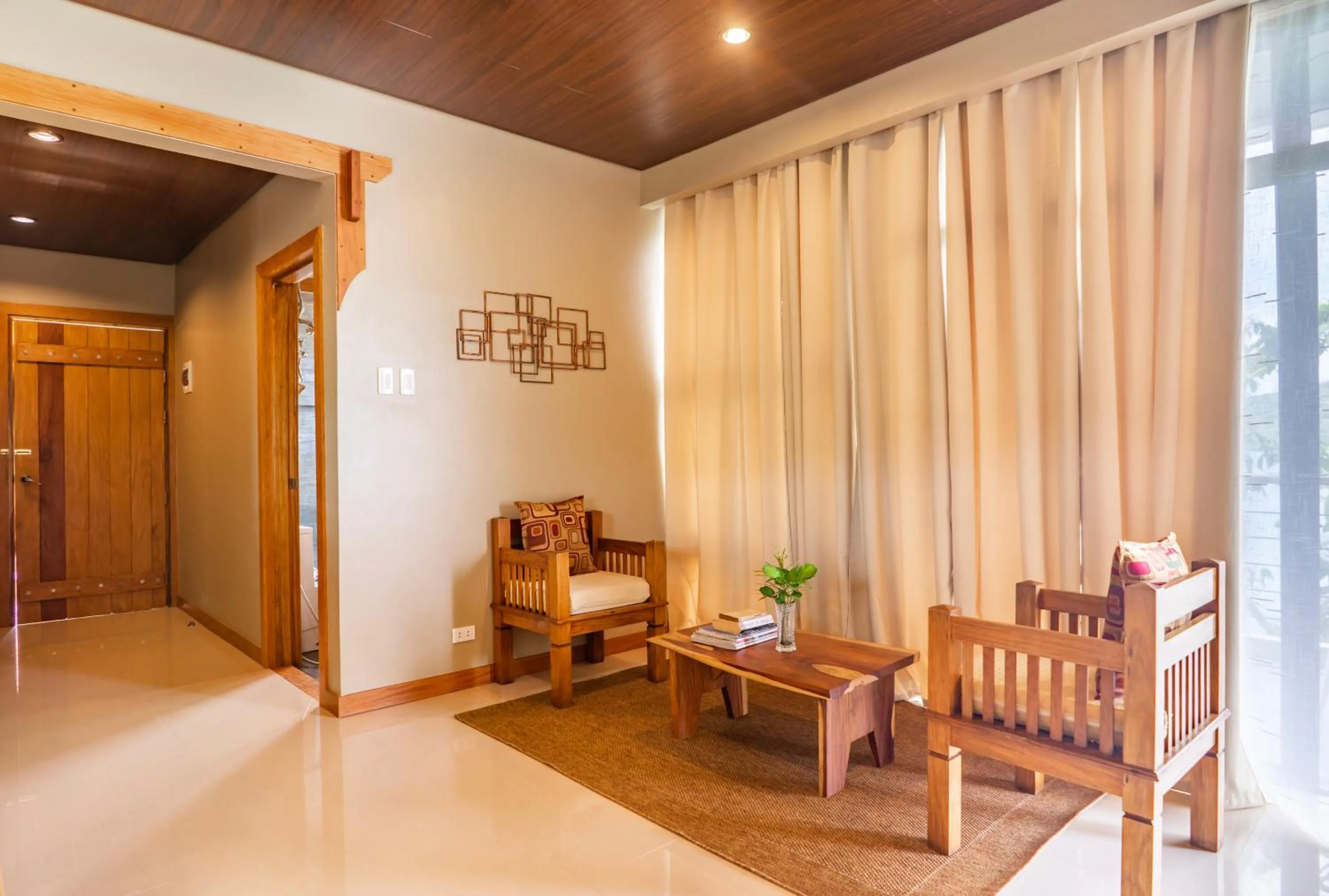 Seating area in La Estancia Busuanga