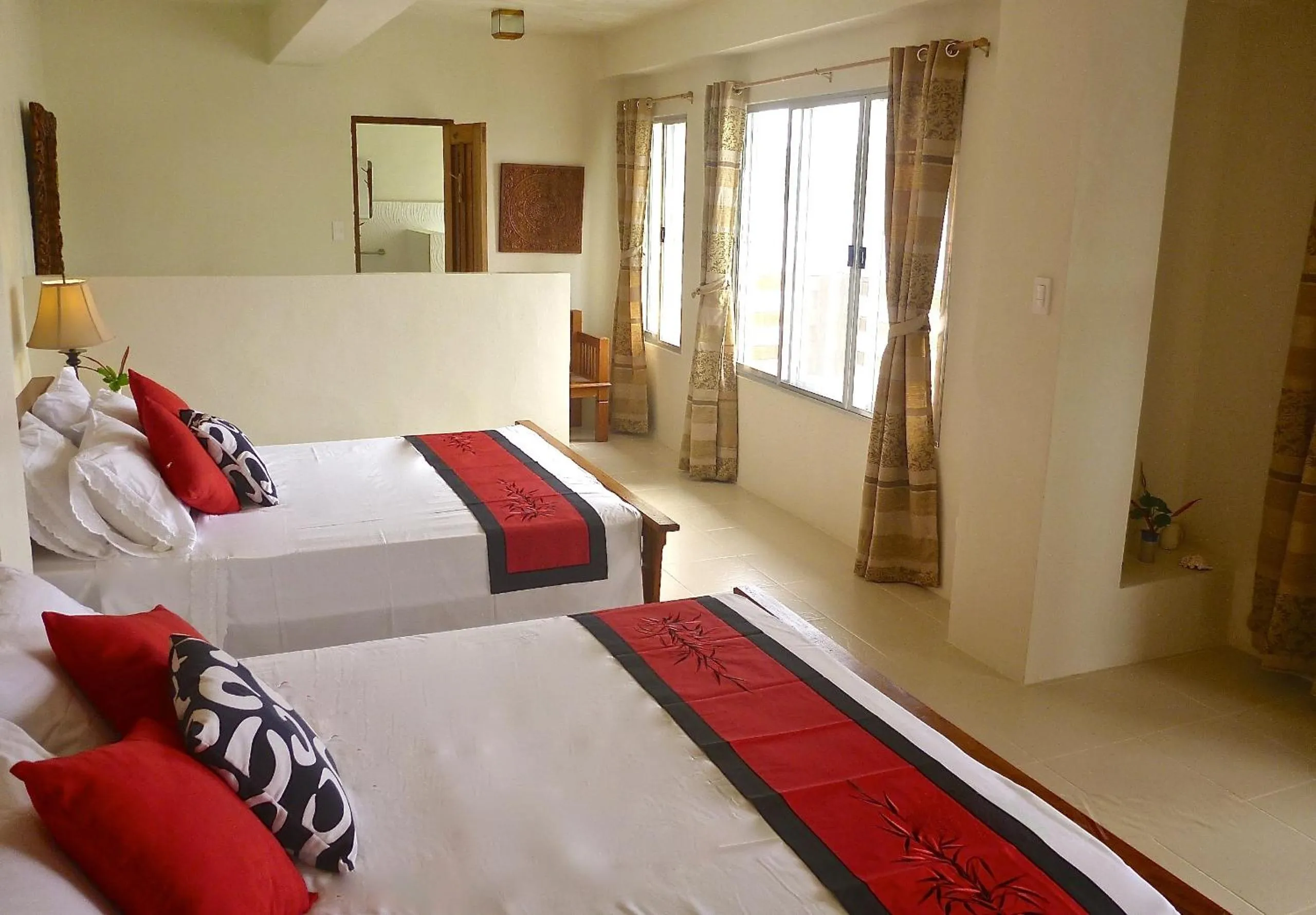 Photo of the whole room, Bed in La Estancia Busuanga