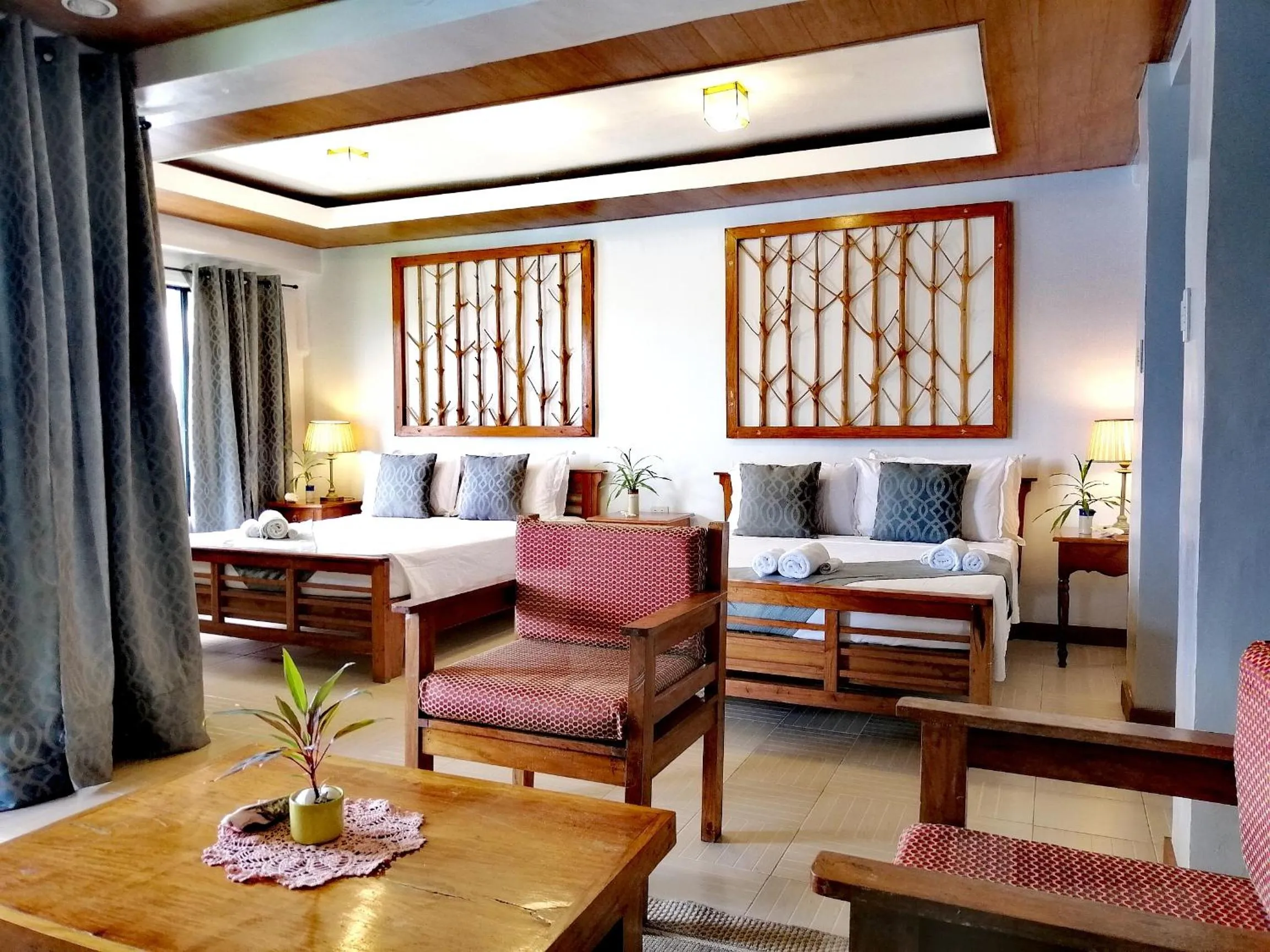 Photo of the whole room, Bed in La Estancia Busuanga